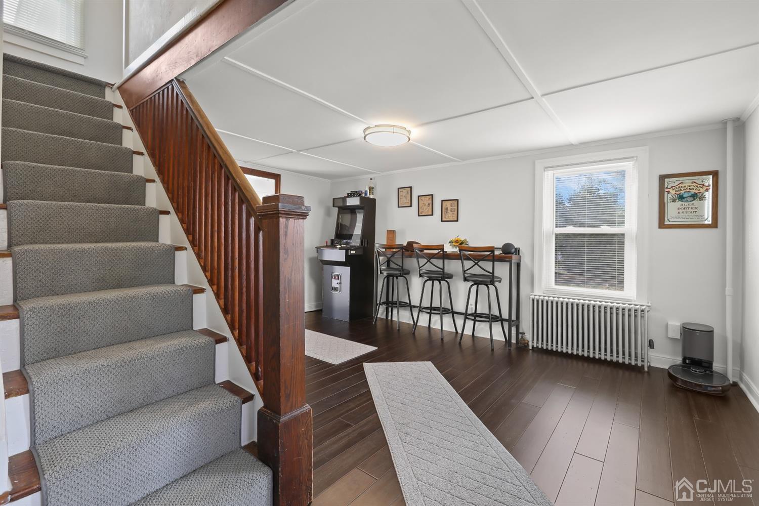385 Ridge Road Dayton, NJ 08810 - Photo 11 of 29 a view of entryway and hall with wooden floor