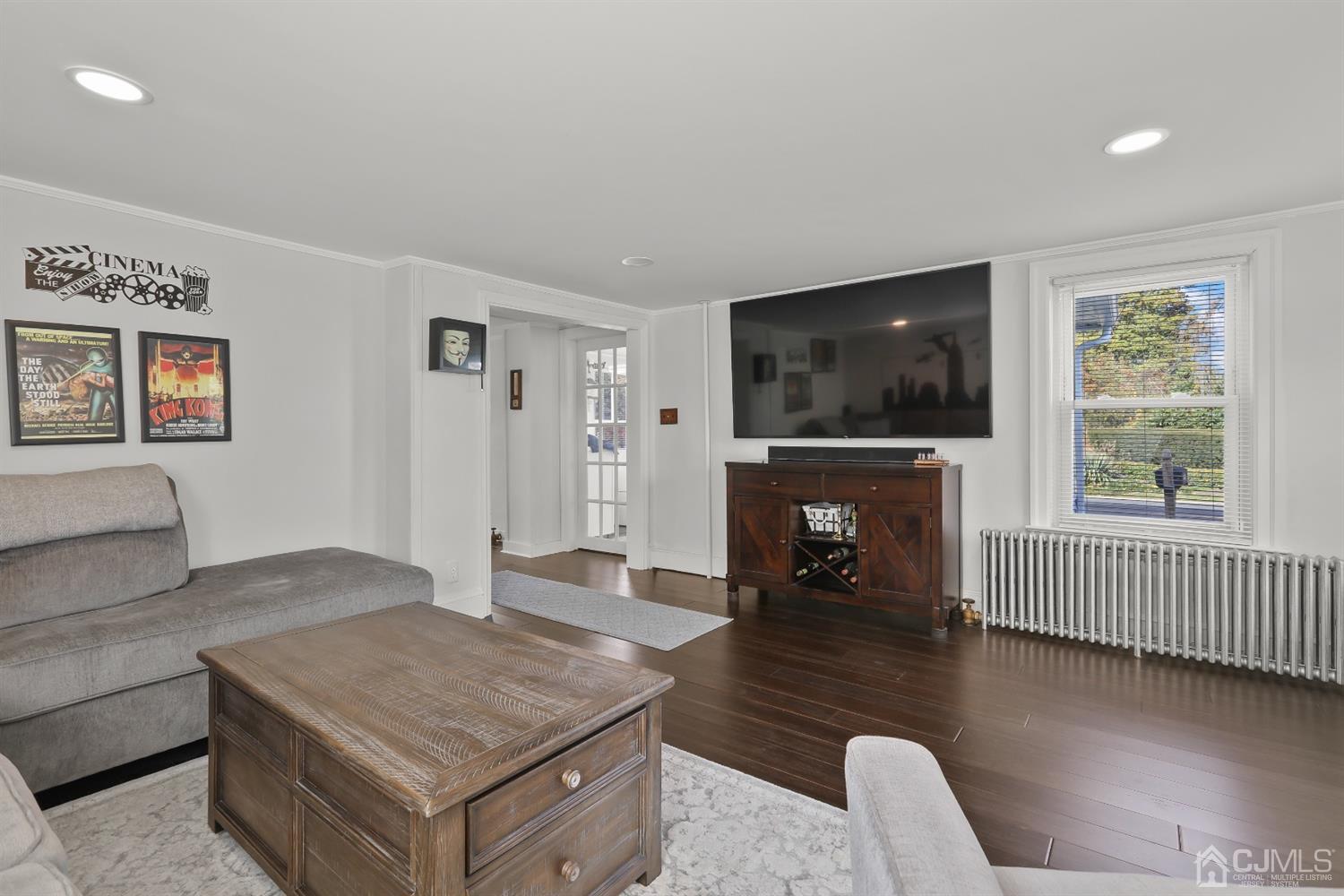 385 Ridge Road Dayton, NJ 08810 - Photo 12 of 29 a living room with furniture and a fireplace