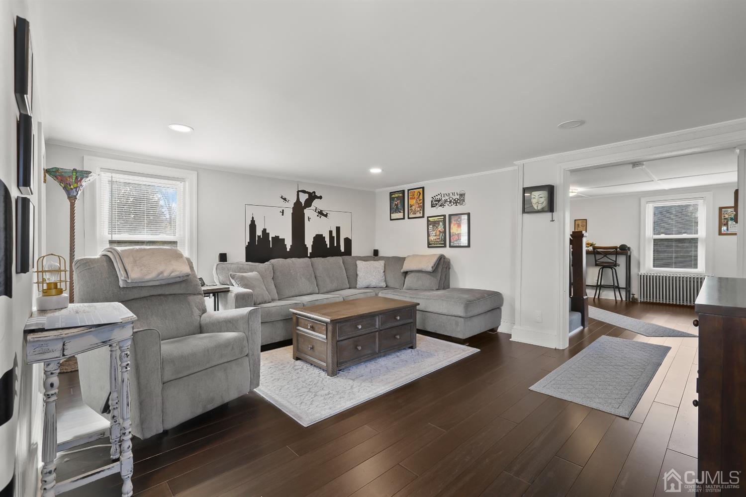 385 Ridge Road Dayton, NJ 08810 - Photo 13 of 29 a living room with furniture and a wooden floor