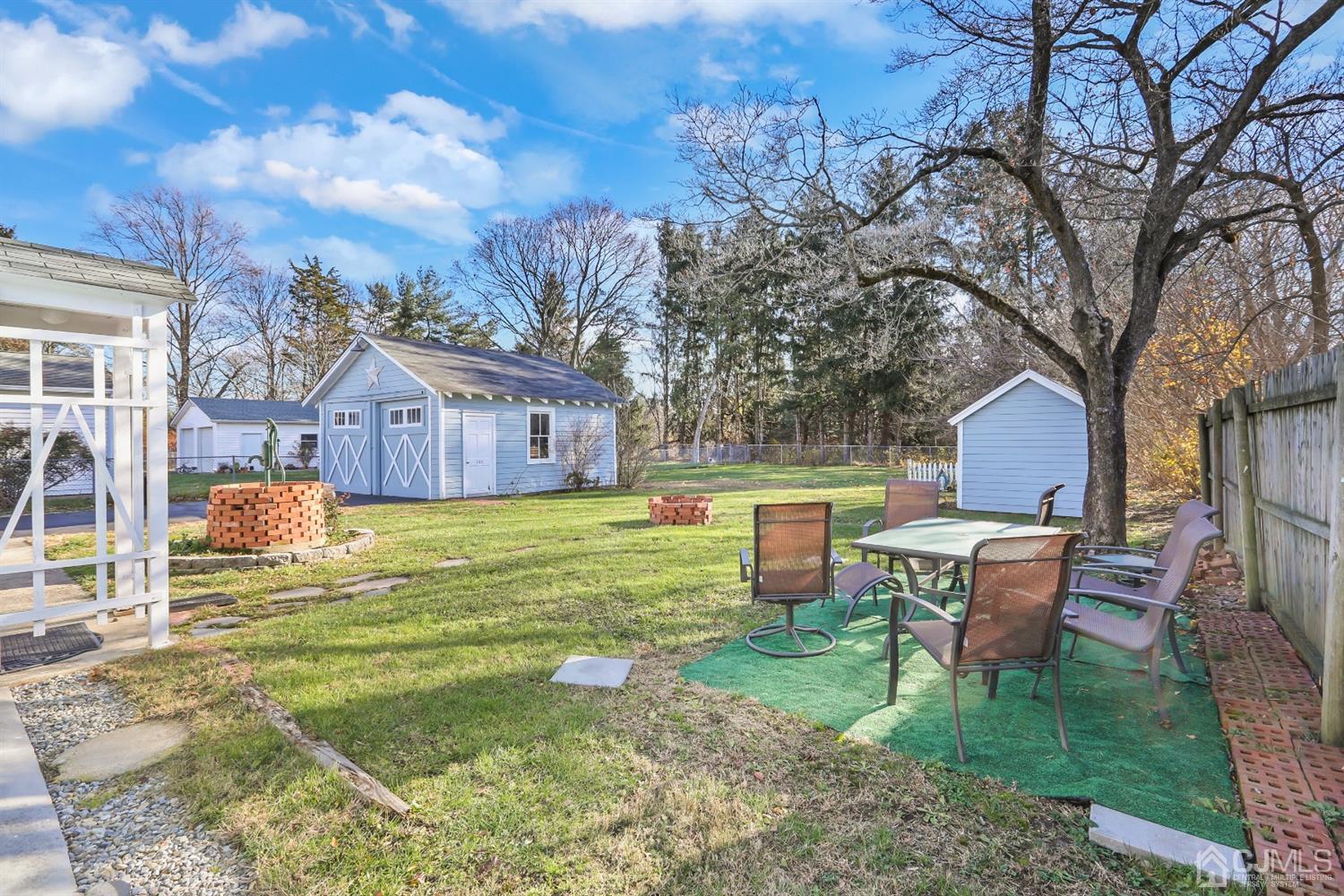 385 Ridge Road Dayton, NJ 08810 - Photo 25 of 29 a house view with a sitting space and garden