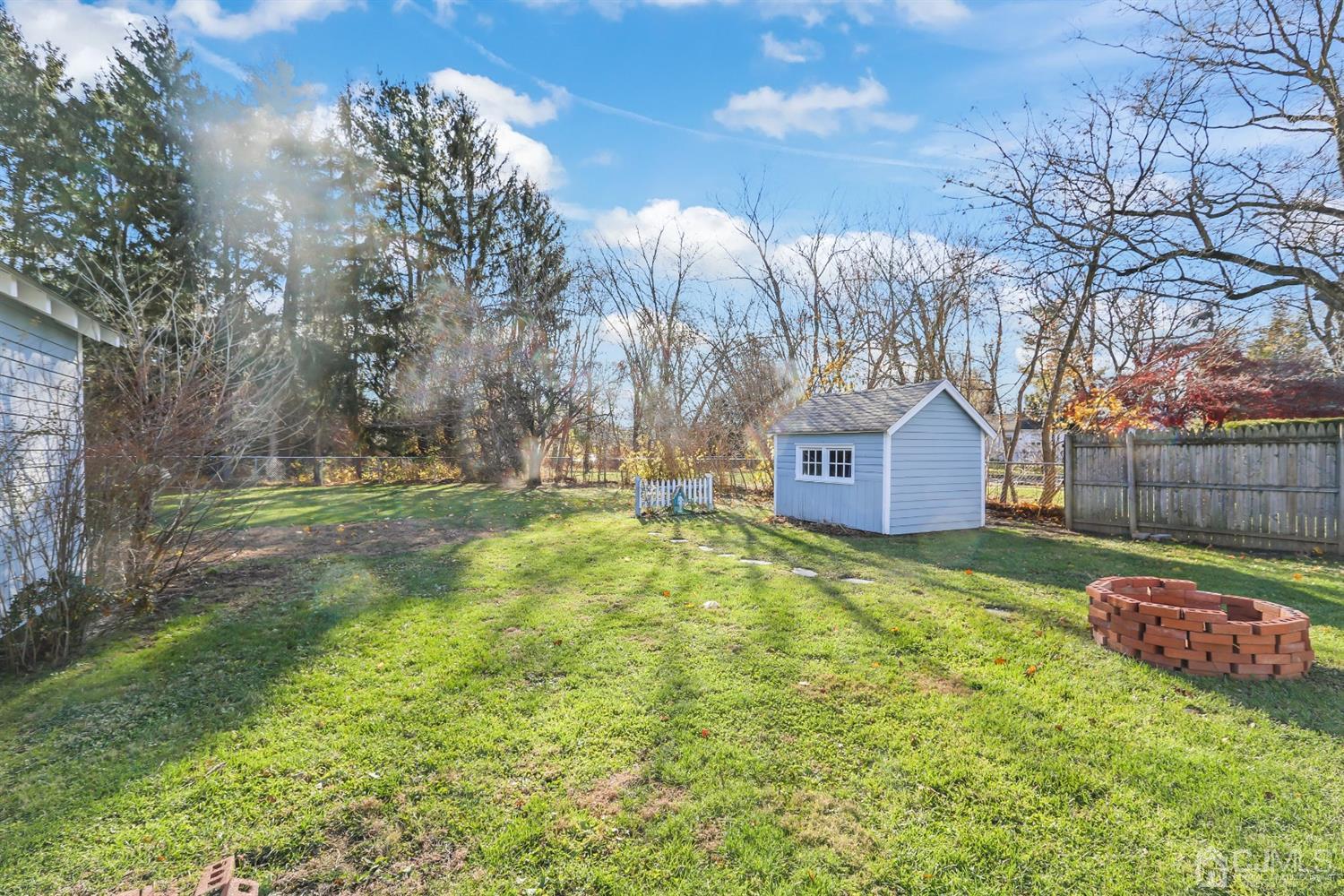 385 Ridge Road Dayton, NJ 08810 - Photo 26 of 29 a view of a house with yard and tree s
