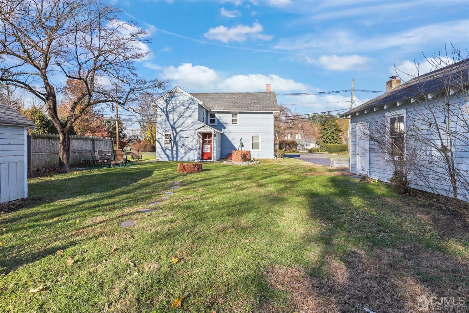 385 Ridge Road Dayton, NJ 08810 - Photo 27 of 29 a view of a house with a yard