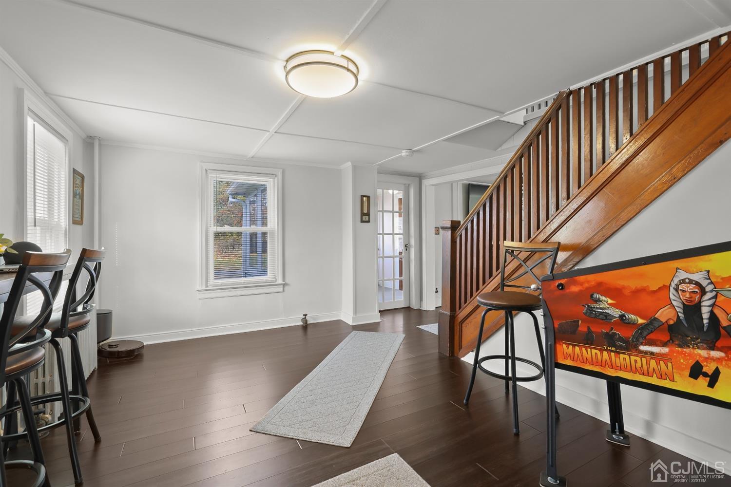 385 Ridge Road Dayton, NJ 08810 - Photo 9 of 29 a view of an entryway with wooden floor and stairs