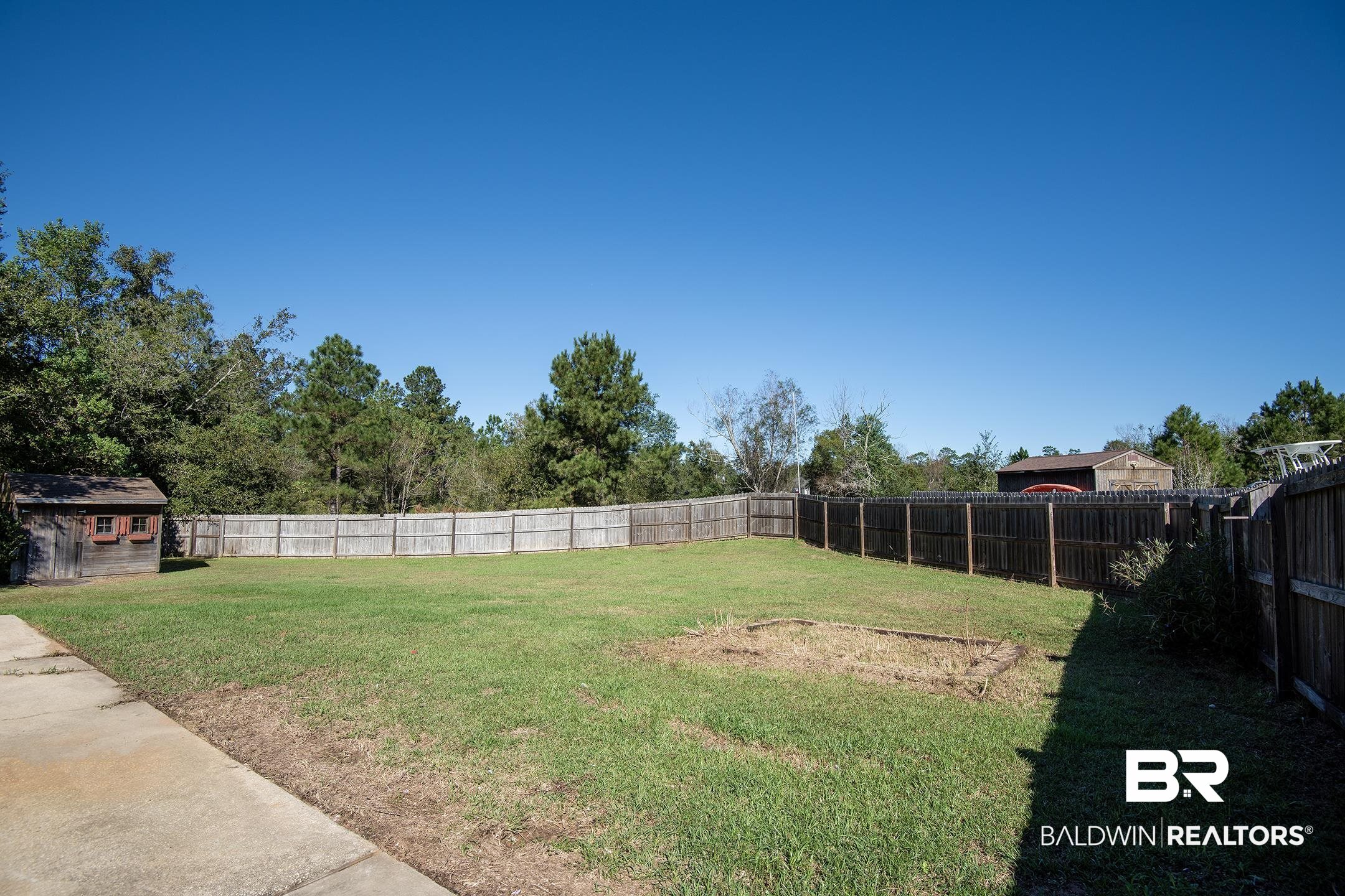 15345 Fremont Court Foley, AL 36535 - Photo 34 of 35 View of yard with a storage shed