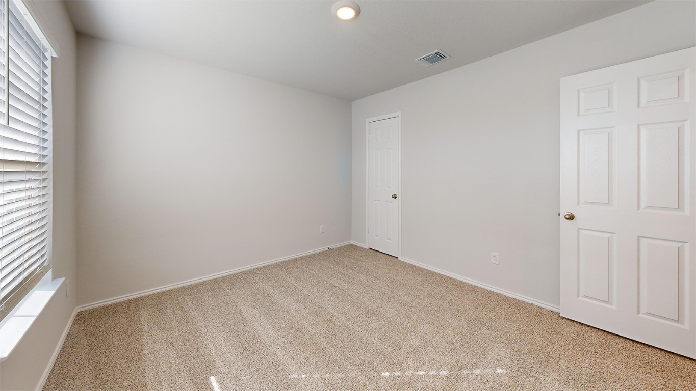 6801 Gilbert Drive Killeen, TX 76549 - Photo 18 of 27 an empty room with windows