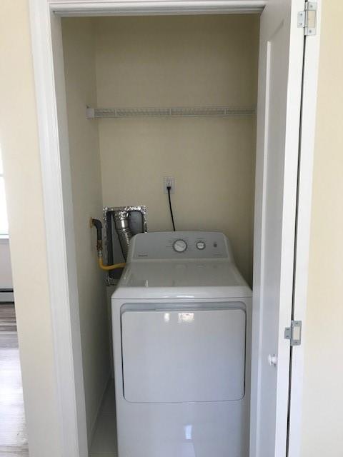 19 Stanton Road Brooklyn, NY 11235 - Photo 11 of 12 a utility room with dryer and washer