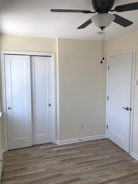 19 Stanton Road Brooklyn, NY 11235 - Photo 6 of 12 a view of an empty room with wooden floor