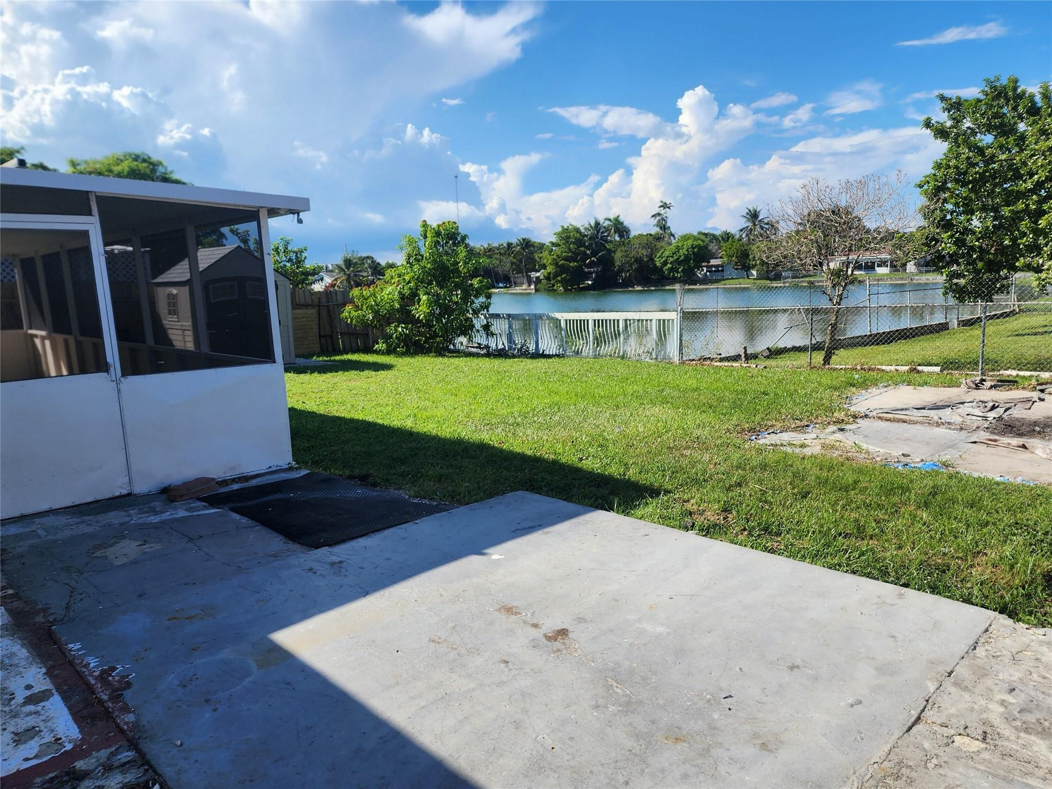 704 Southwest 4th Street Hallandale Beach, FL 33009 - Photo 11 of 33 a view of a backyard with green space