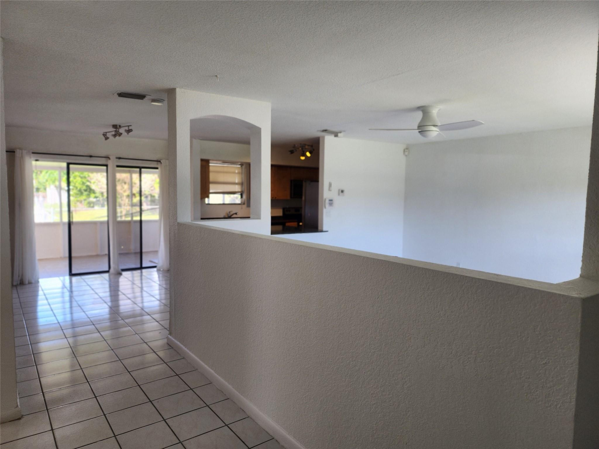704 Southwest 4th Street Hallandale Beach, FL 33009 - Photo 18 of 33 an empty room with windows