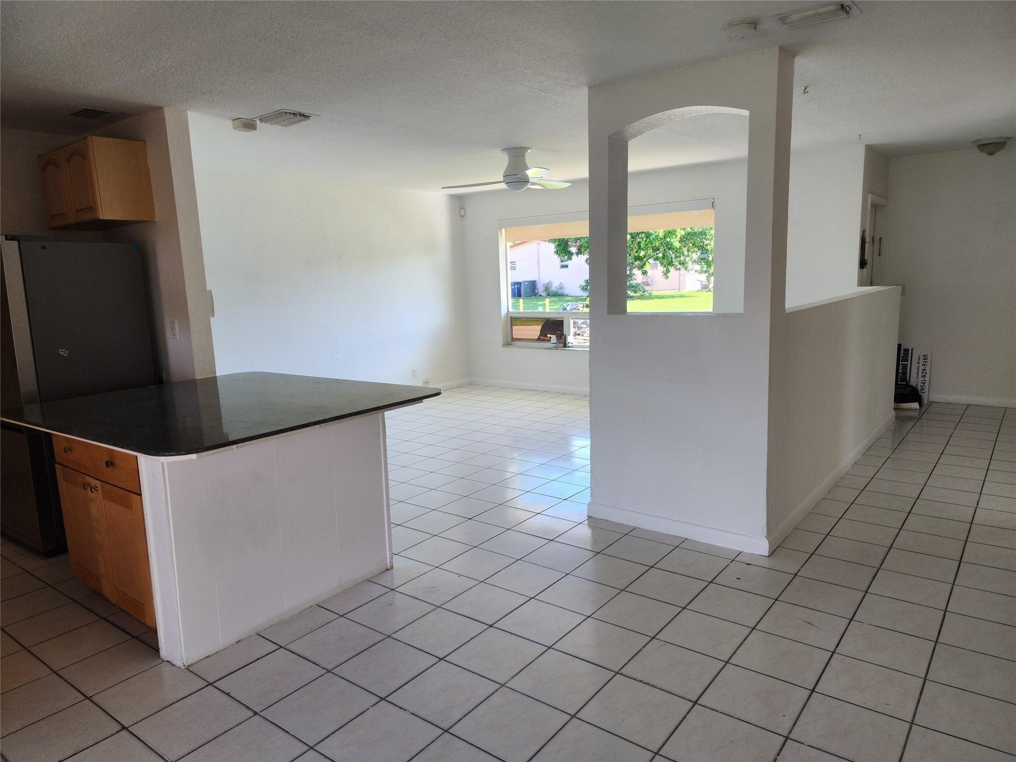 704 Southwest 4th Street Hallandale Beach, FL 33009 - Photo 21 of 33 a view of kitchen cabinets