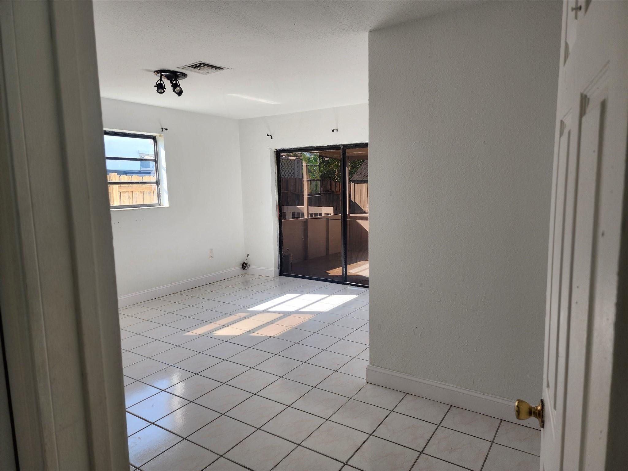704 Southwest 4th Street Hallandale Beach, FL 33009 - Photo 25 of 33 a view of empty room