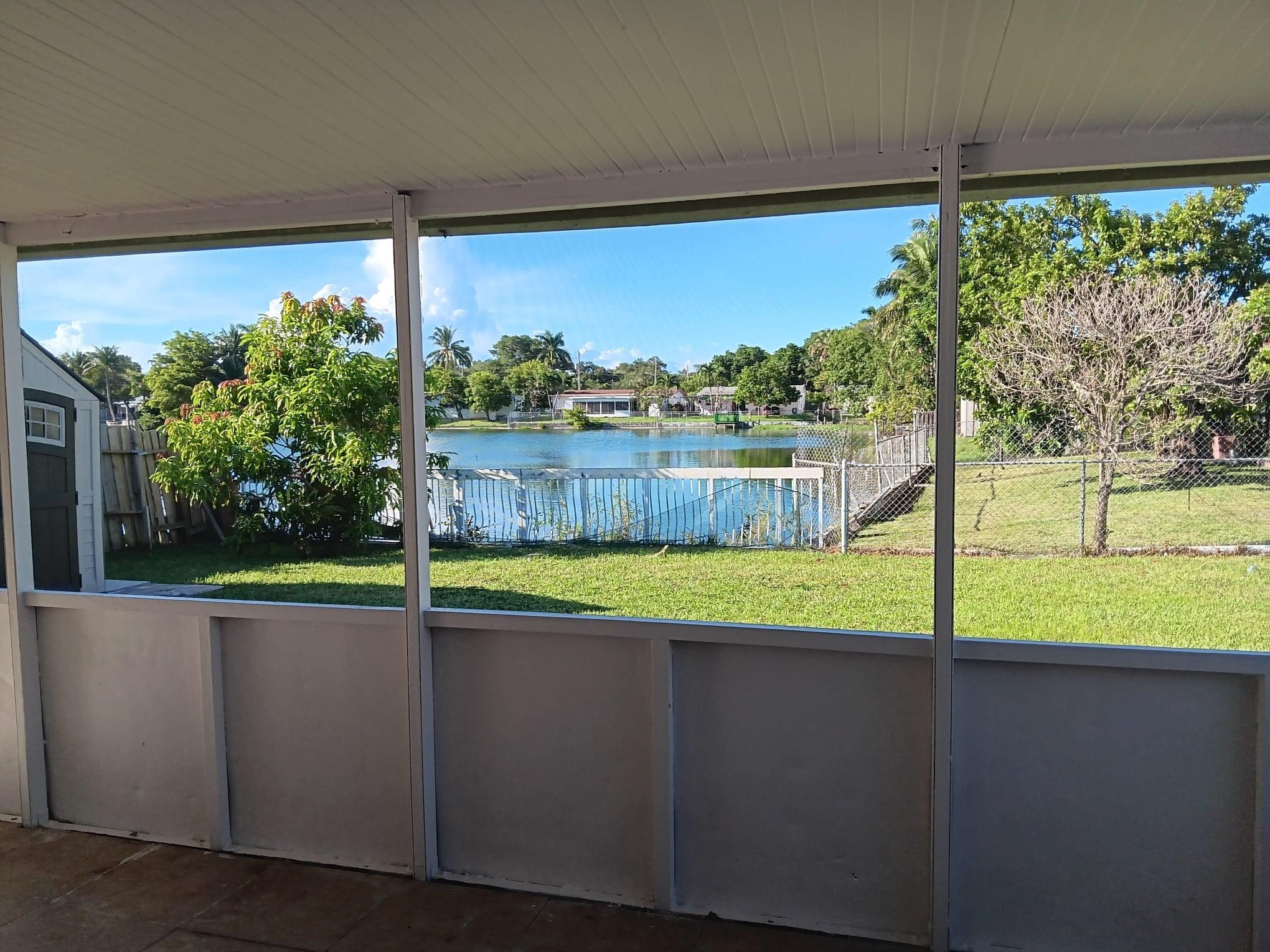 704 Southwest 4th Street Hallandale Beach, FL 33009 - Photo 3 of 33 a view of outdoor space and yard