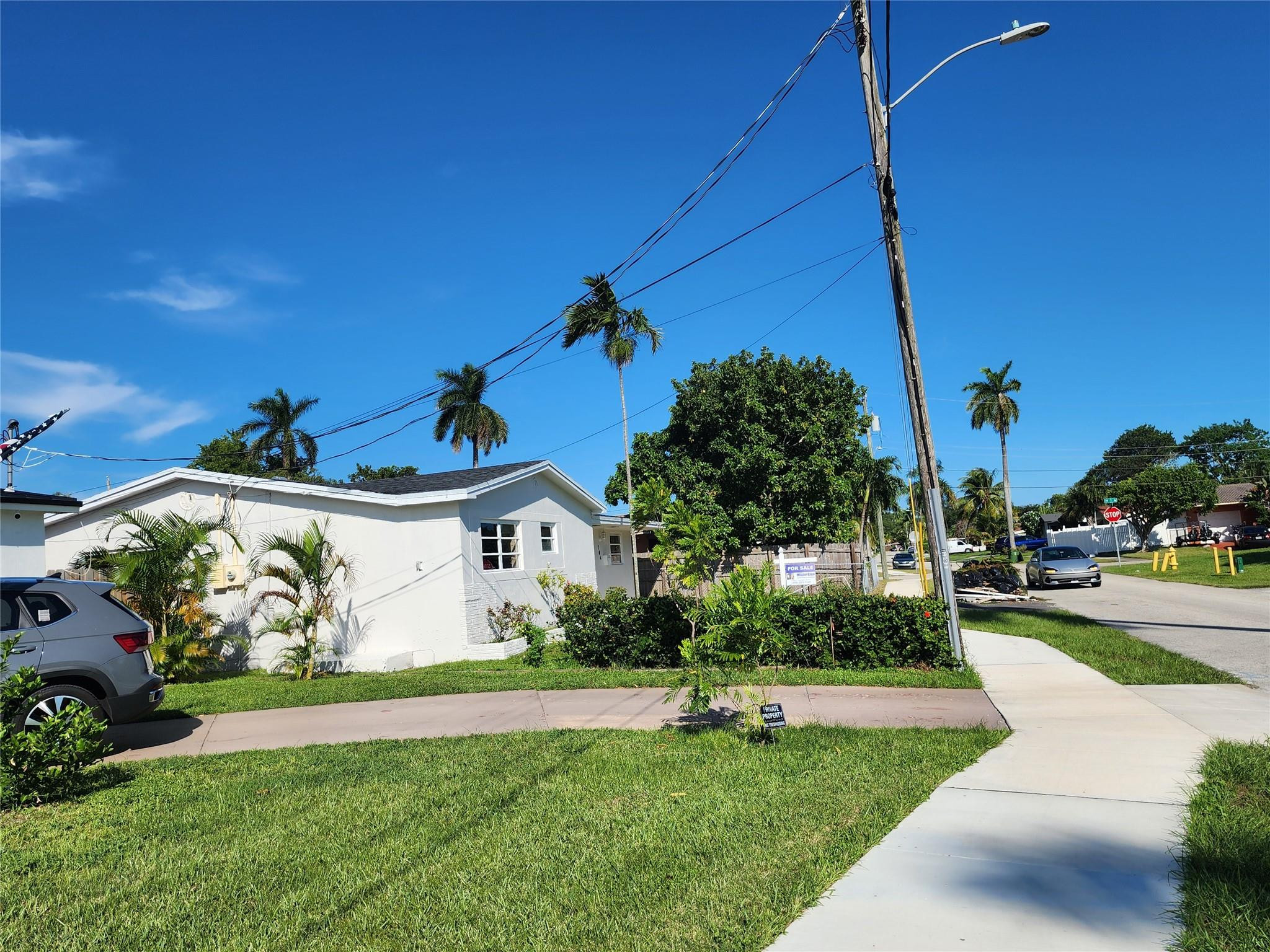 704 Southwest 4th Street Hallandale Beach, FL 33009 - Photo 33 of 33 a view of a house with a yard