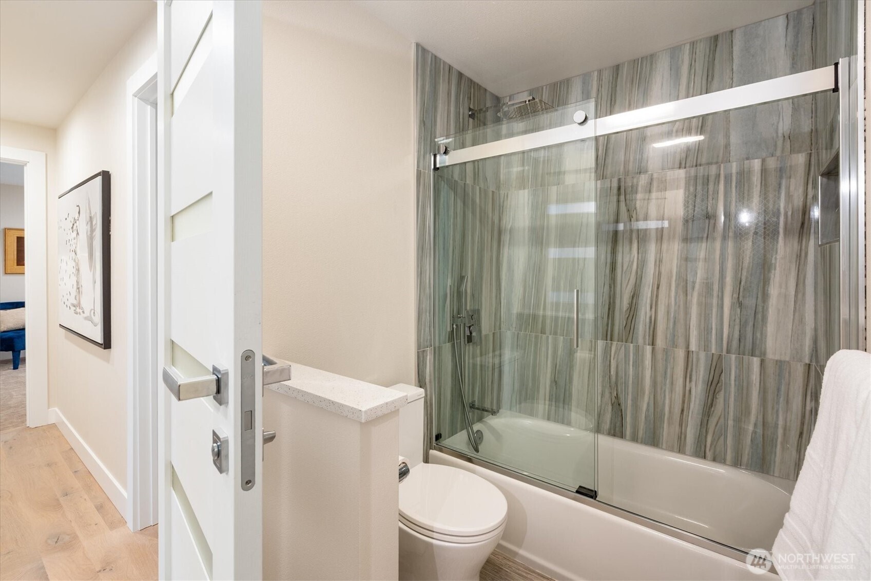 9503 Odin Way Bothell, WA 98011 - Photo 31 of 39 a bathroom with a shower and a toilet