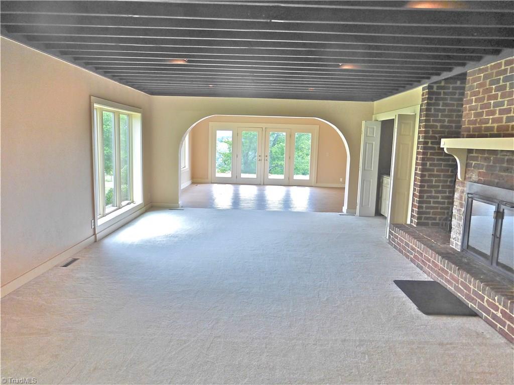470 Crossingham Road Mount Airy, NC 27030 - Photo 10 of 30 living room, looking into Sun/Recreation room