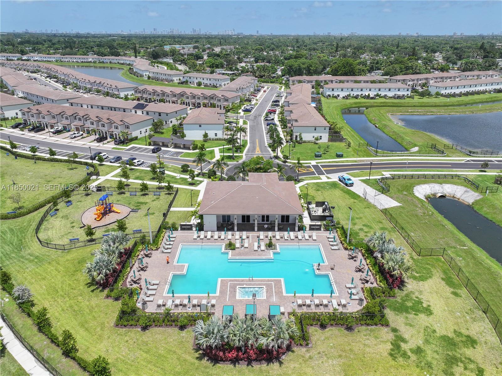 12561 Northwest 23rd Place Miami, FL 33167 - Photo 37 of 45 an aerial view of a house with a swimming pool