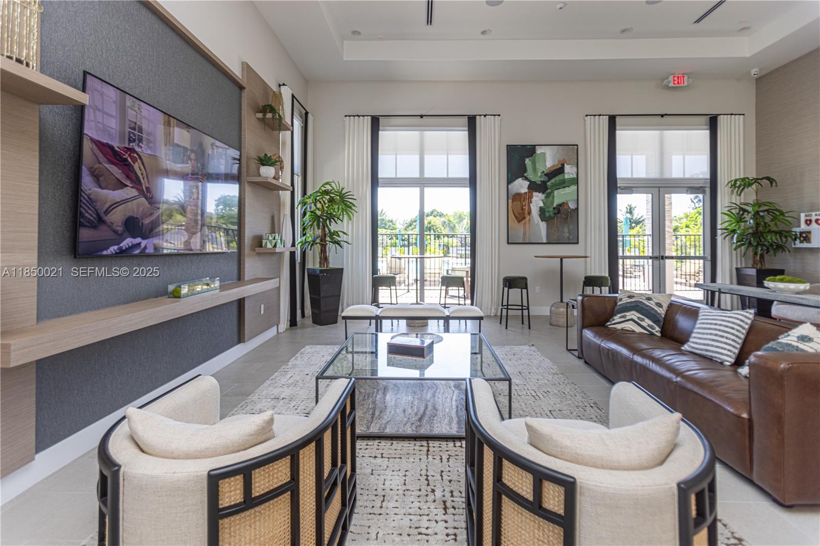 12561 Northwest 23rd Place Miami, FL 33167 - Photo 38 of 45 a living room with furniture and a large window