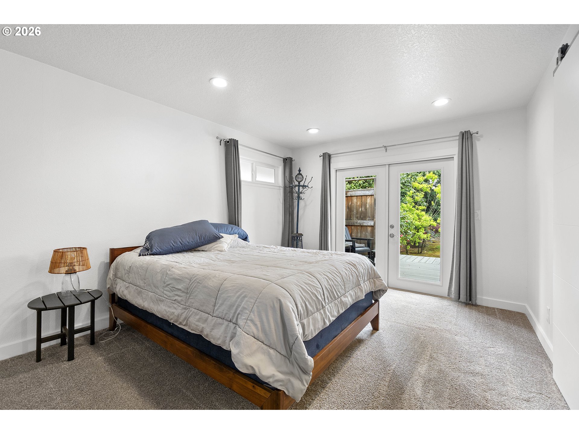 11465 Southwest 92nd Avenue Portland, OR 97223 - Photo 19 of 47 a bedroom with a bed and window