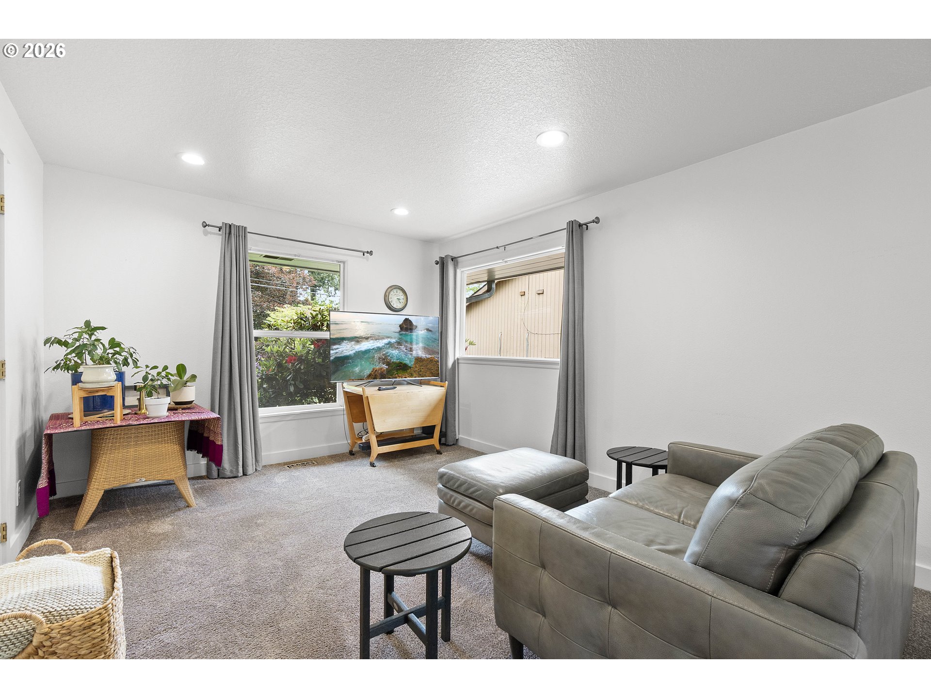 11465 Southwest 92nd Avenue Portland, OR 97223 - Photo 22 of 47 a living room with furniture and a table