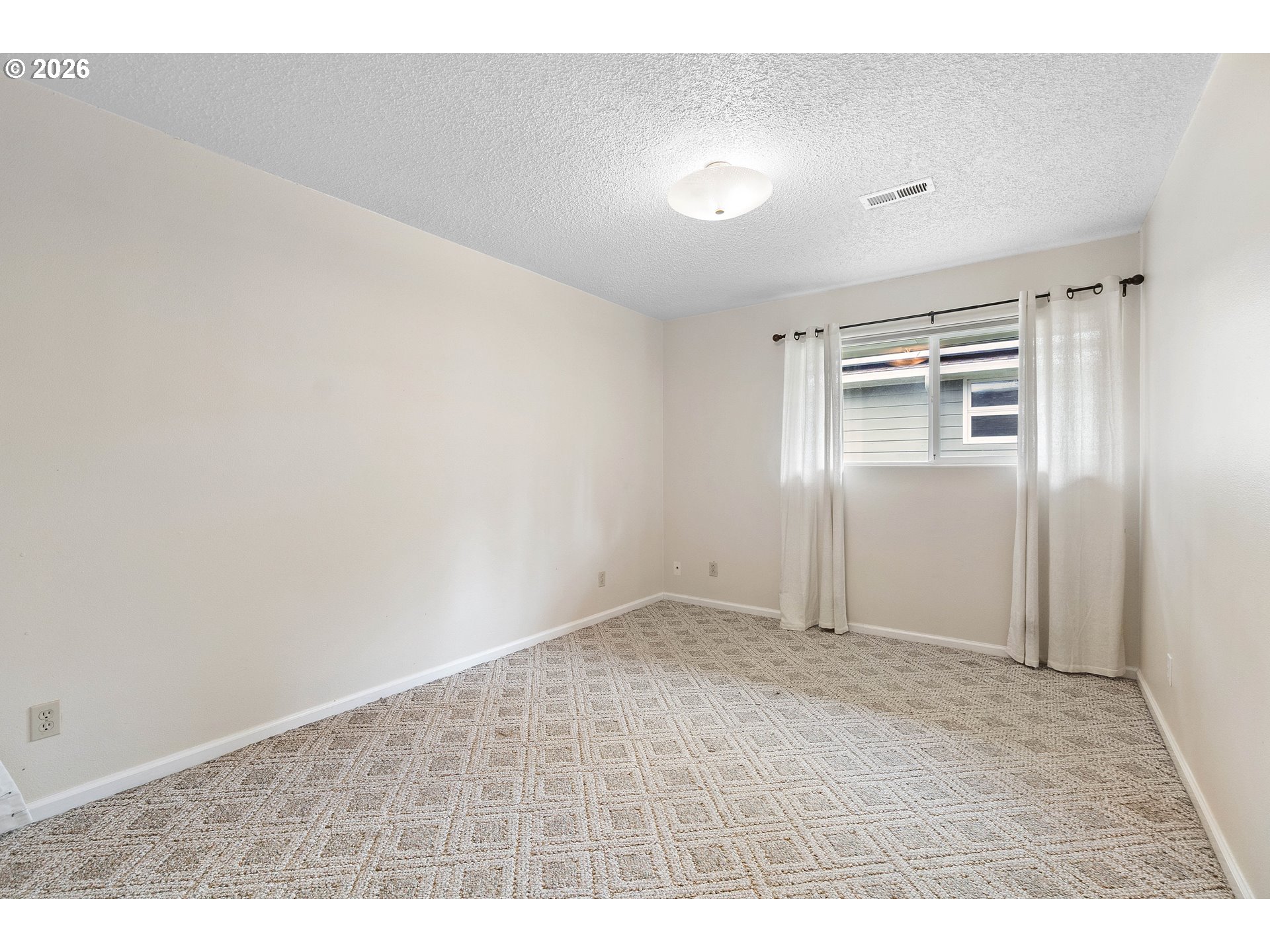 11465 Southwest 92nd Avenue Portland, OR 97223 - Photo 29 of 47 view of empty room with wooden floor