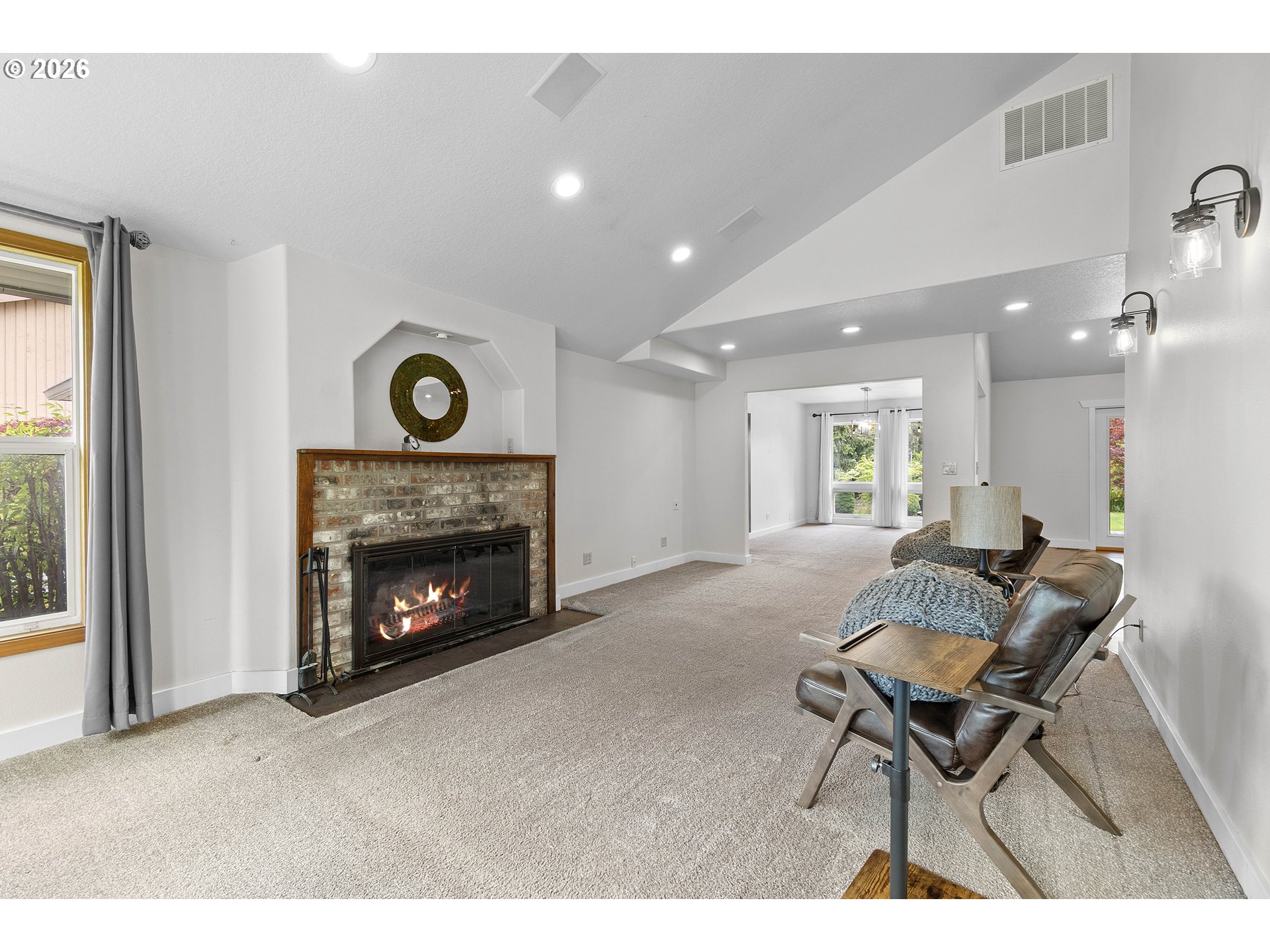 11465 Southwest 92nd Avenue Portland, OR 97223 - Photo 4 of 47 a living room with furniture and a fireplace