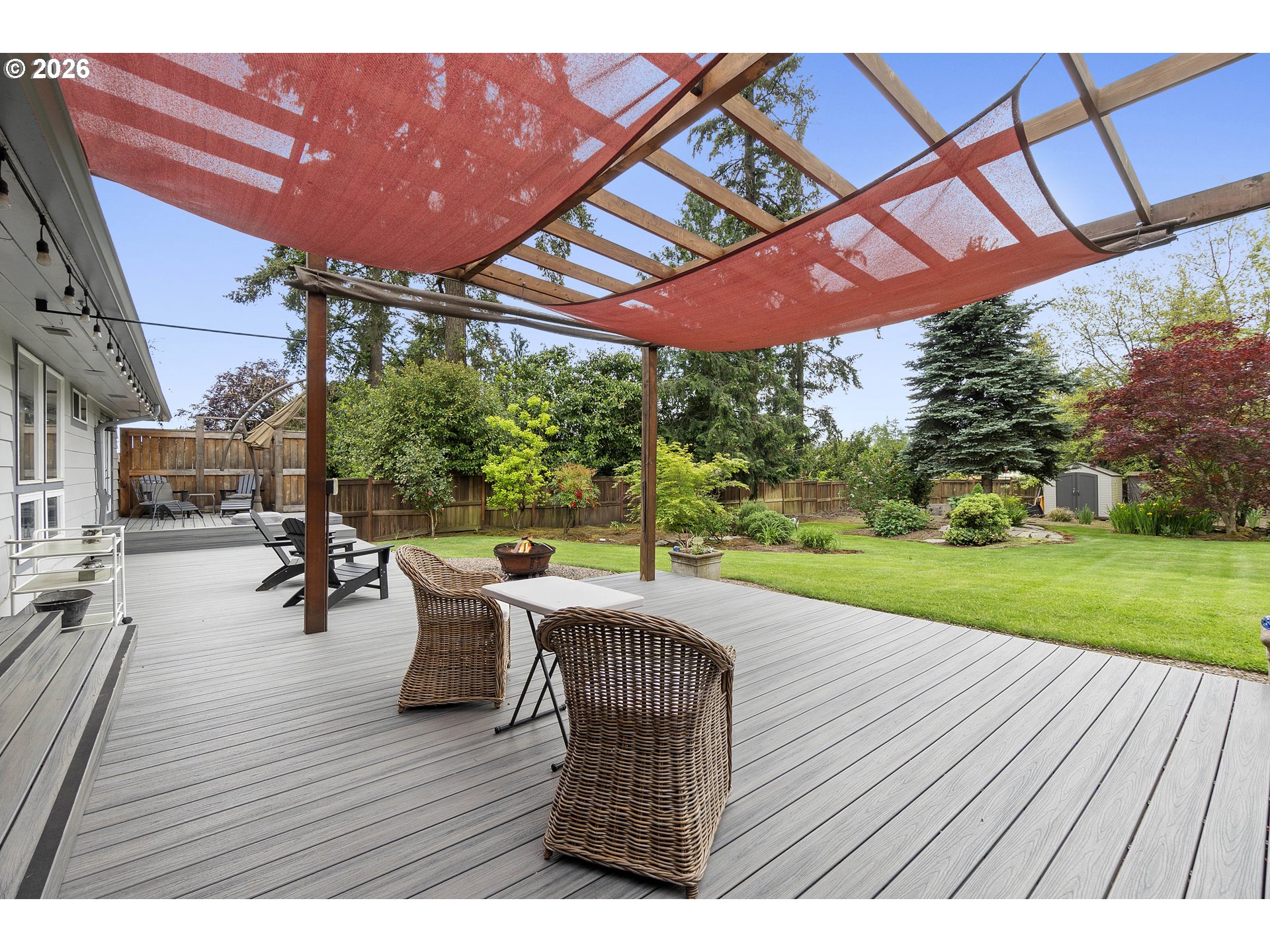 11465 Southwest 92nd Avenue Portland, OR 97223 - Photo 41 of 47 a view of a patio with table and chairs and wooden floor