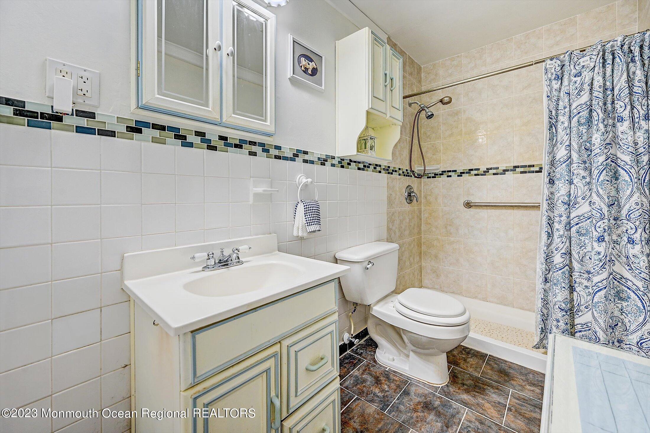40 Smith Street Howell, NJ 07731 - Photo 19 of 25 a bathroom with a sink toilet and shower