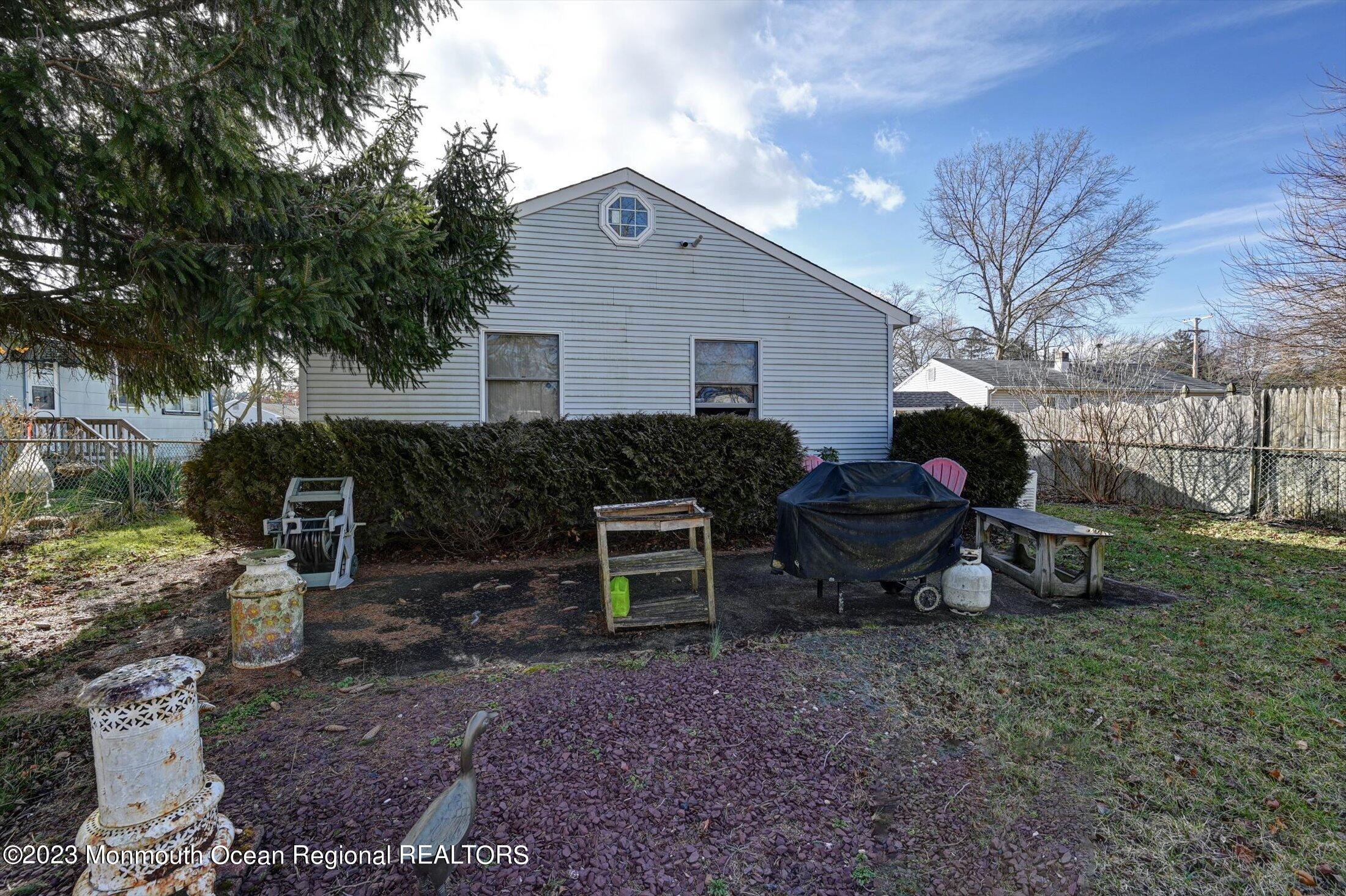 40 Smith Street Howell, NJ 07731 - Photo 21 of 25 a view of a house with backyard and chairs