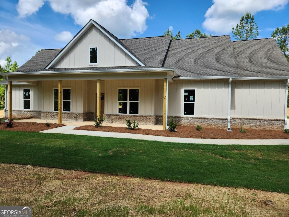 1730 Brownlee Road Jackson, GA 30233 - Photo 1 of 1 a front view of a house with a yard