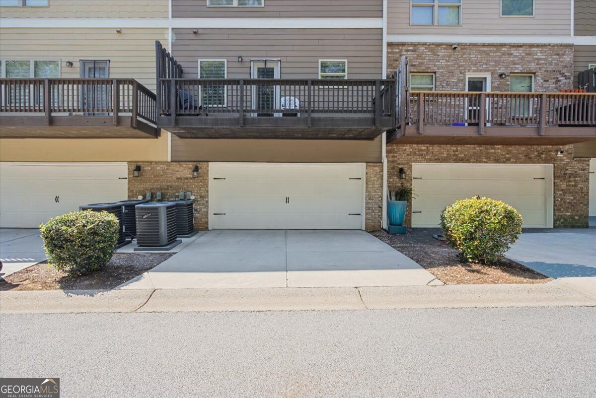 4192 Integrity Way Powder Springs, GA 30127 - Photo 27 of 29 Entrance to garage is situated on alley road on the backside of the home