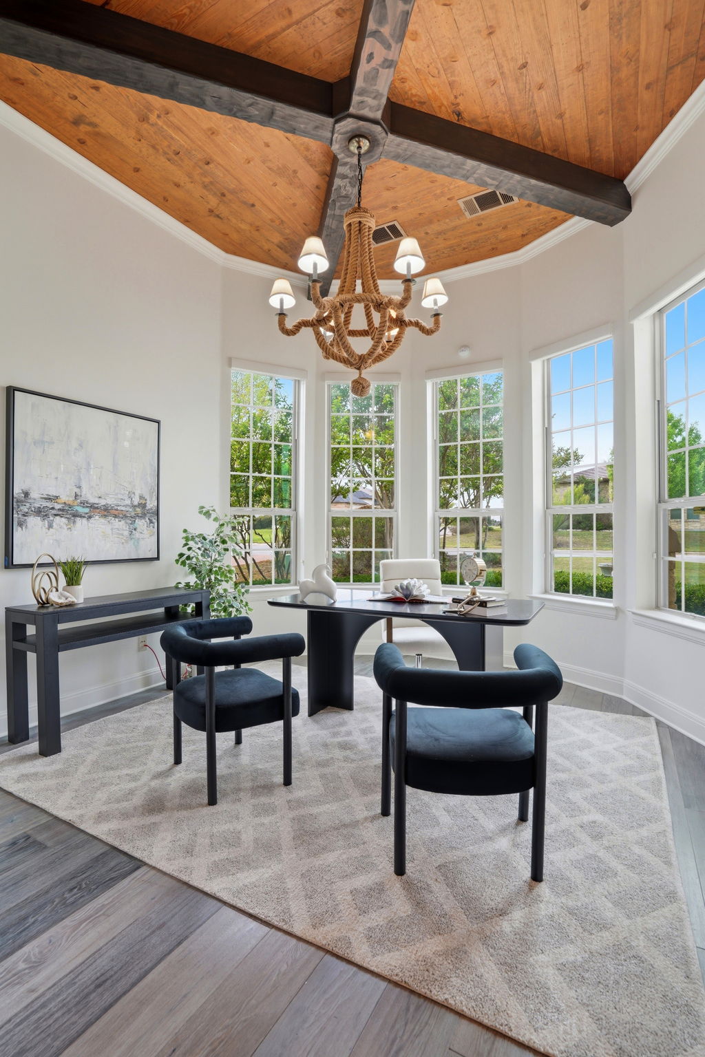 2420 Legend Trail Leander, TX 78641 - Photo 15 of 40 Work from home in style under a magnificent vaulted wood-plank ceiling. The unique rope-wrapped chandelier and bay windows finish this work space.