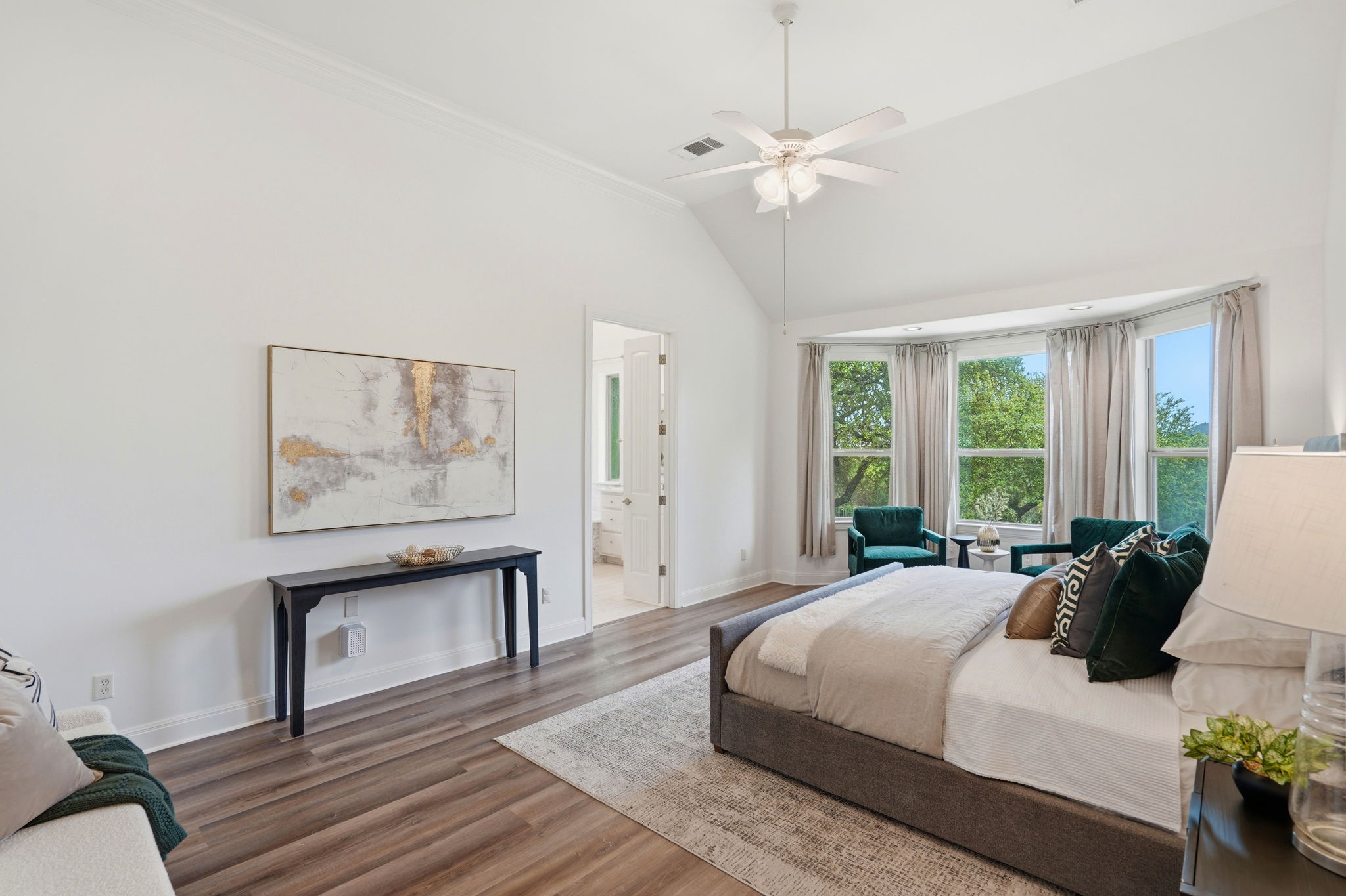 2420 Legend Trail Leander, TX 78641 - Photo 16 of 40 The primary bedroom is located on the main floor and has treetop views right outside your window.