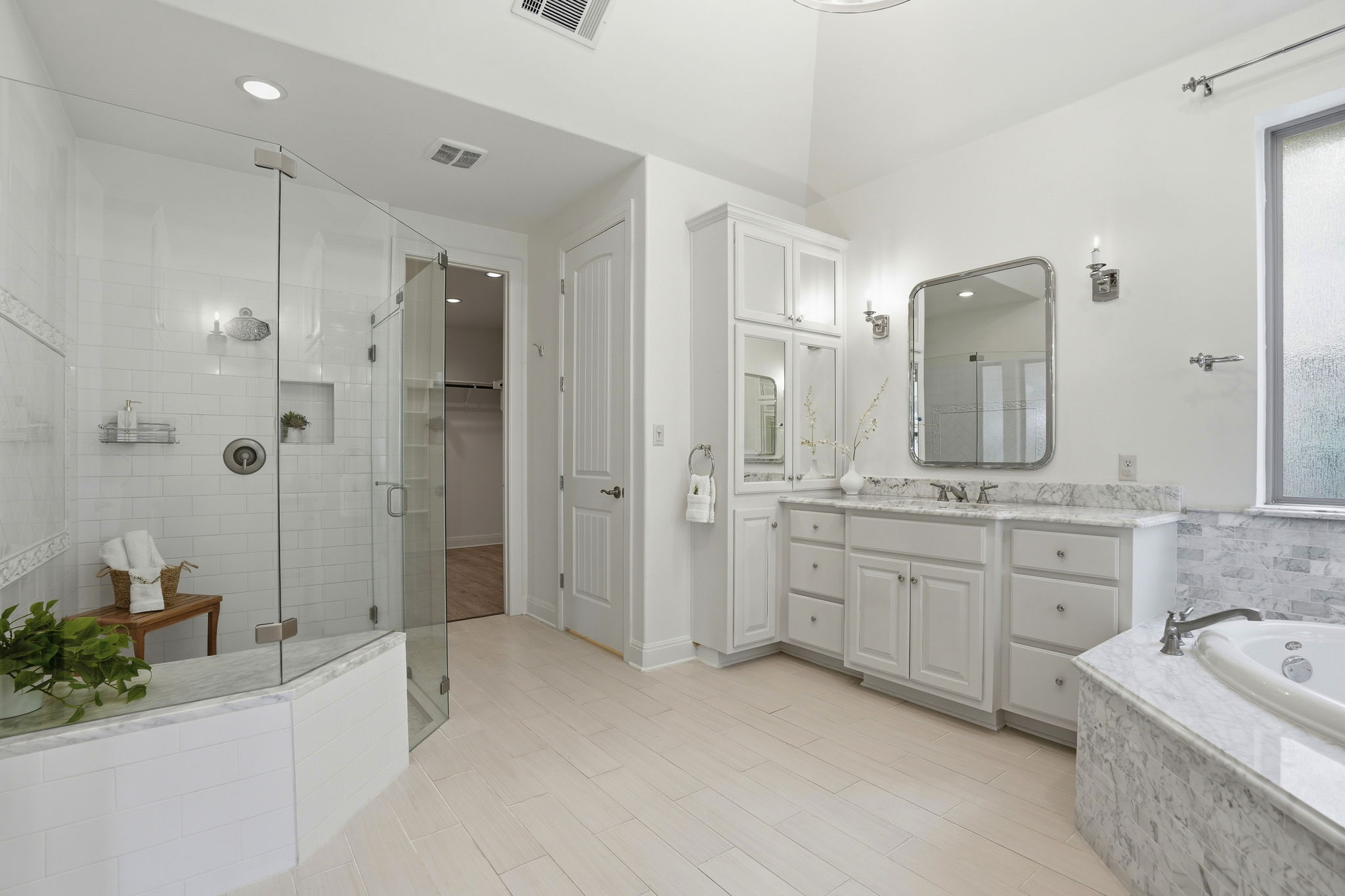 2420 Legend Trail Leander, TX 78641 - Photo 19 of 40 An expansive walk-in shower awaits and built-in storage cabinetry ensures a clutter-free environment.