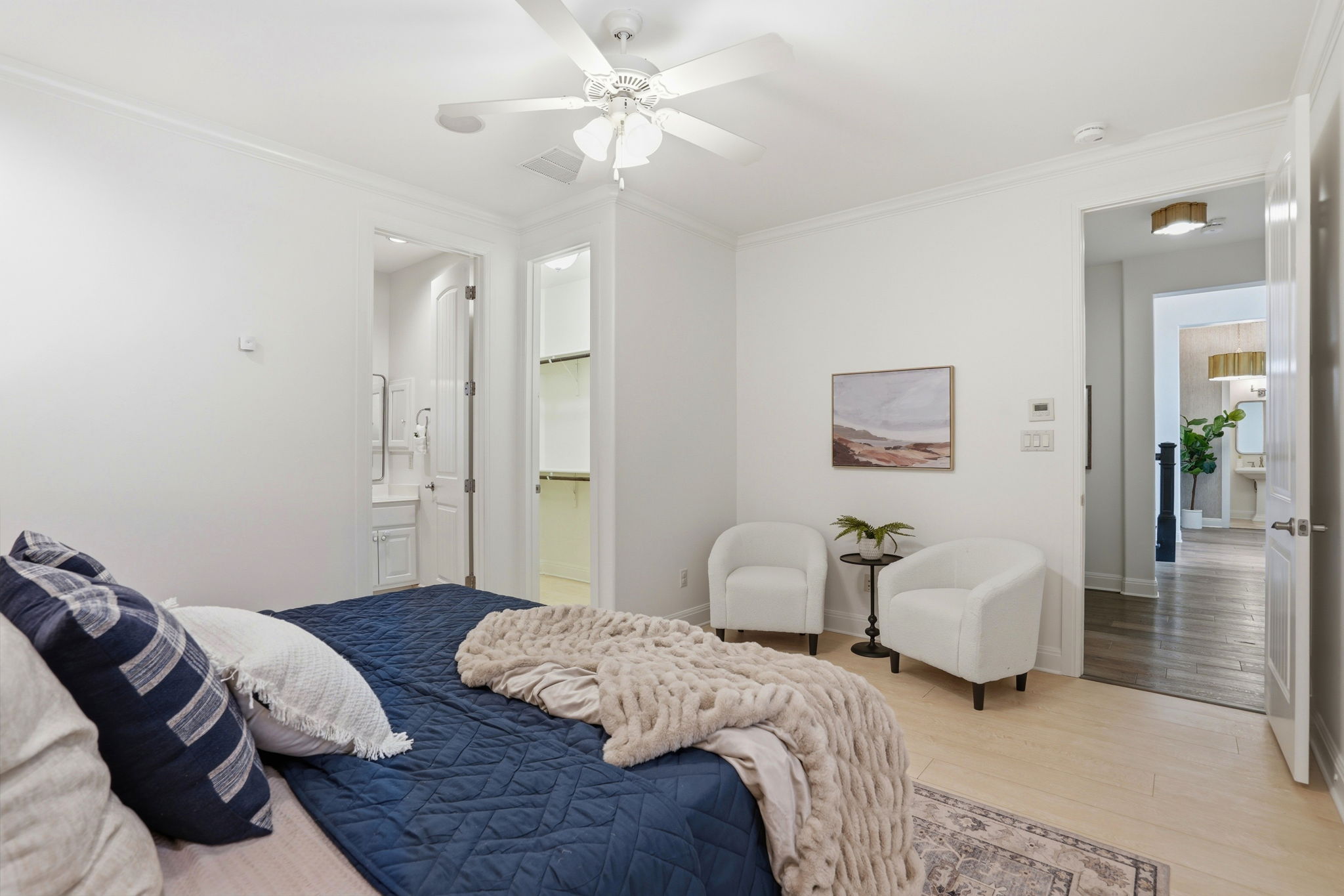 2420 Legend Trail Leander, TX 78641 - Photo 21 of 40 This secondary bedroom is tucked away on the main floor and has its own ensuite bathroom and walk in closet.