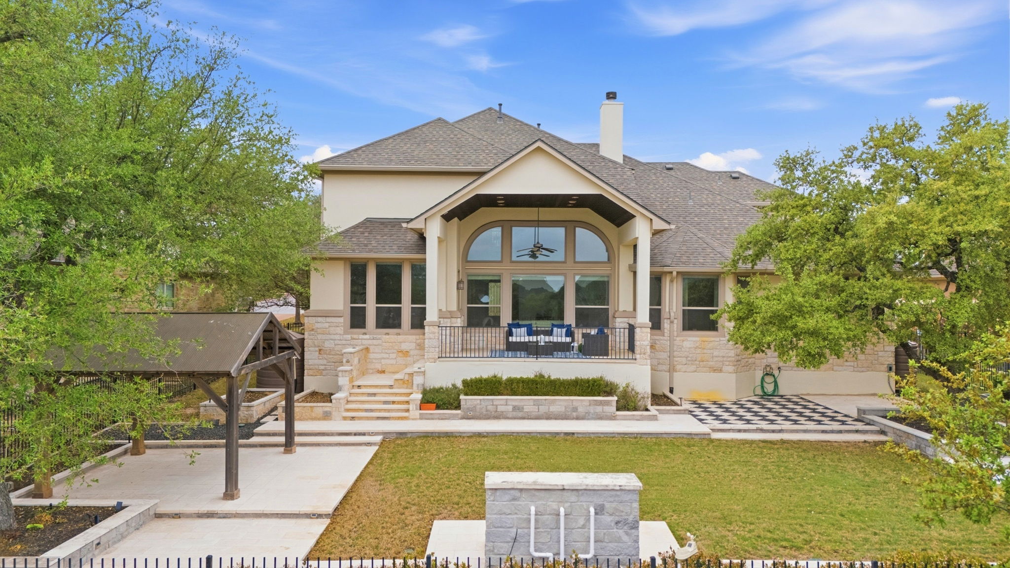 2420 Legend Trail Leander, TX 78641 - Photo 40 of 40 You can see the large trees that provide natural shade and privacy for the patio areas.