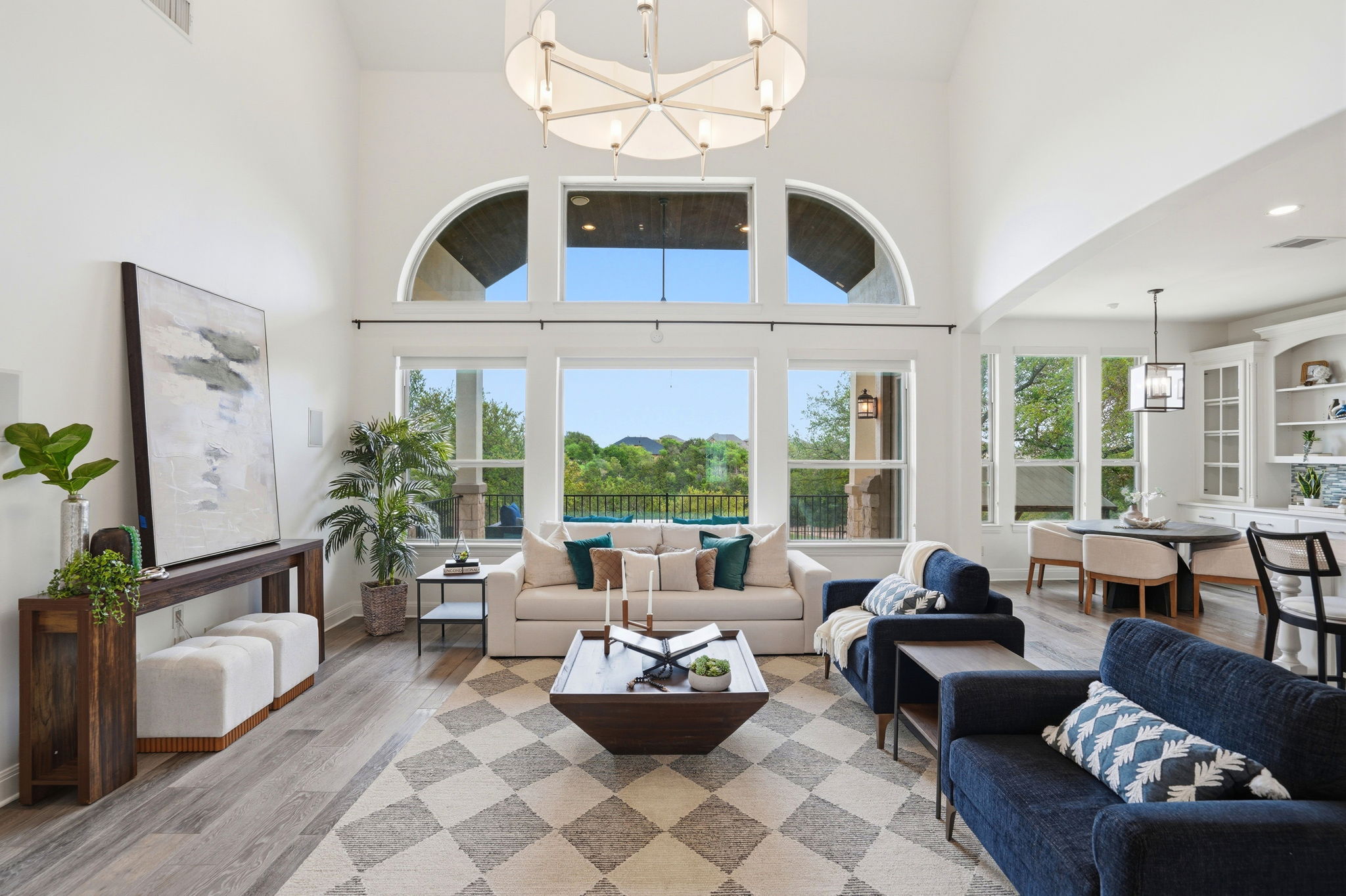 2420 Legend Trail Leander, TX 78641 - Photo 5 of 40 Massive windows frame lush views of the greenbelt and golf course.