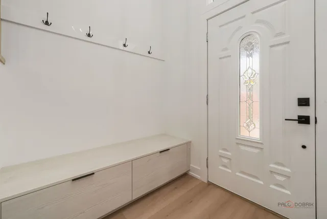 a view of room with window and hardwood floor