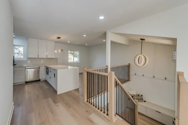 a view of a kitchen with electric appliances