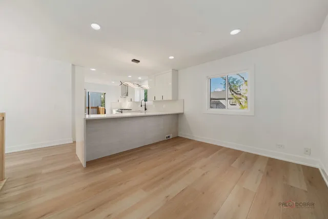 a view of kitchen and front door