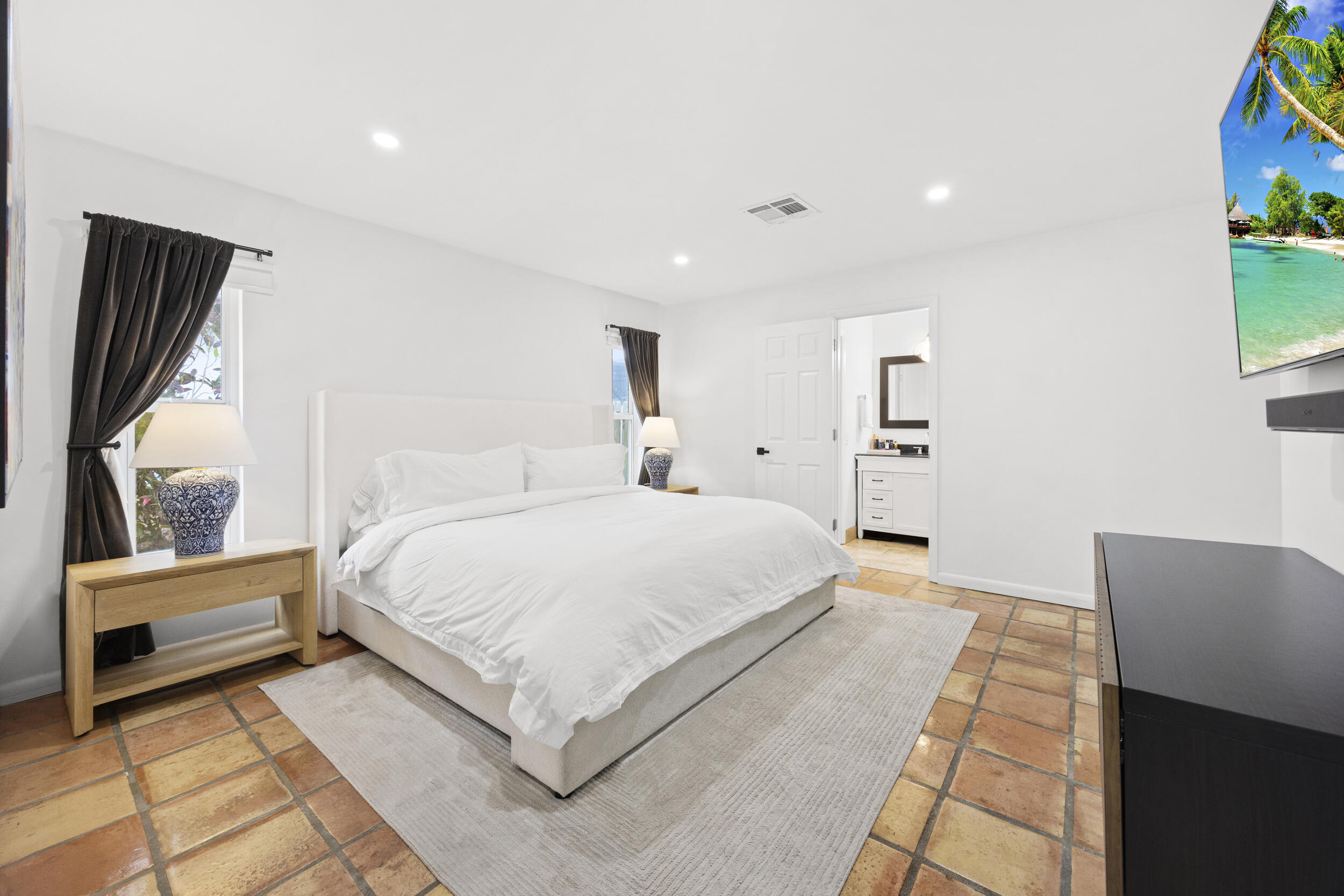 11760 Inverness Circle Wellington, FL 33414 - Photo 14 of 33 a bedroom with a bed and a window