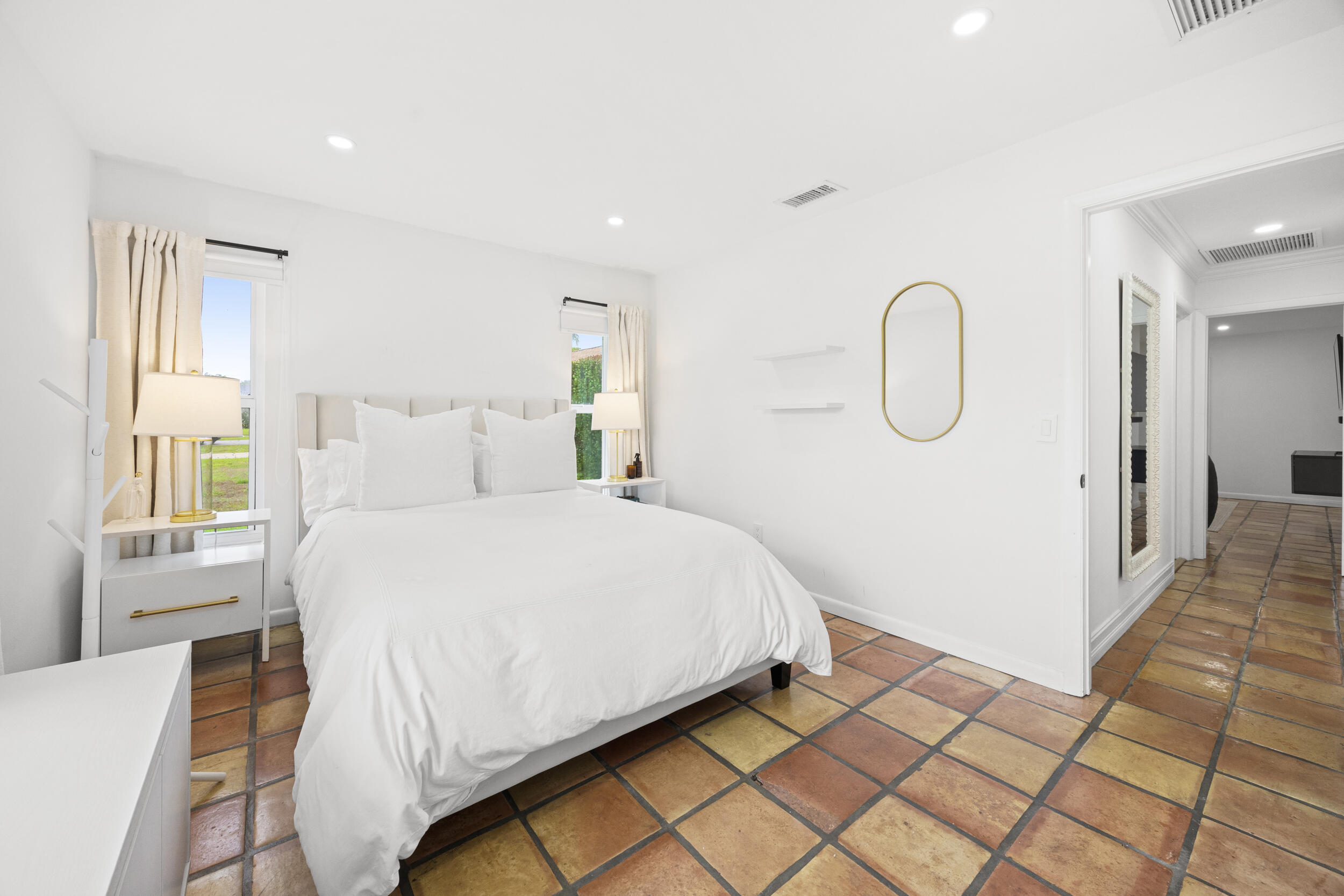 11760 Inverness Circle Wellington, FL 33414 - Photo 23 of 33 a bedroom with a bed and a window