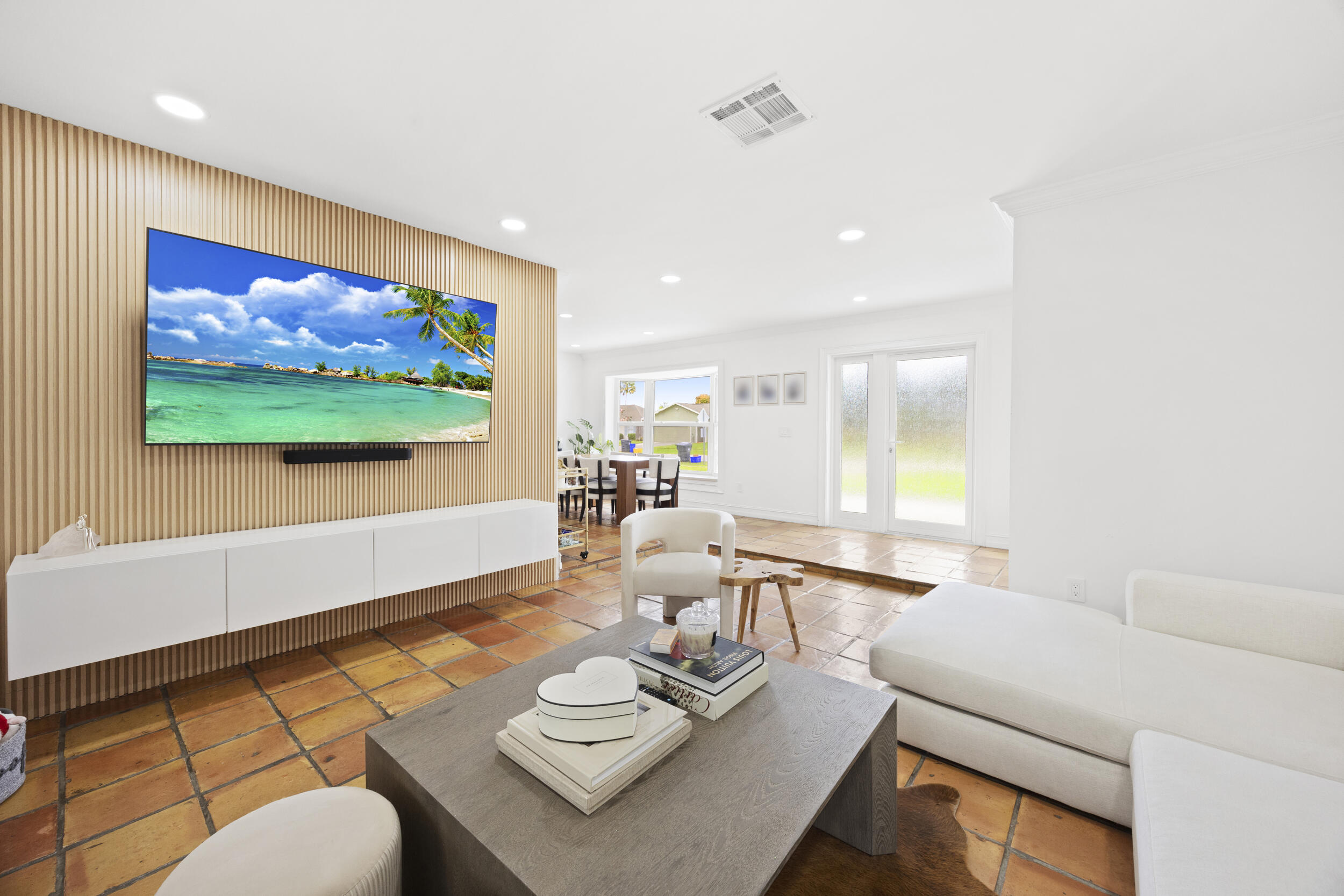 11760 Inverness Circle Wellington, FL 33414 - Photo 8 of 33 a living room with furniture and a flat screen tv
