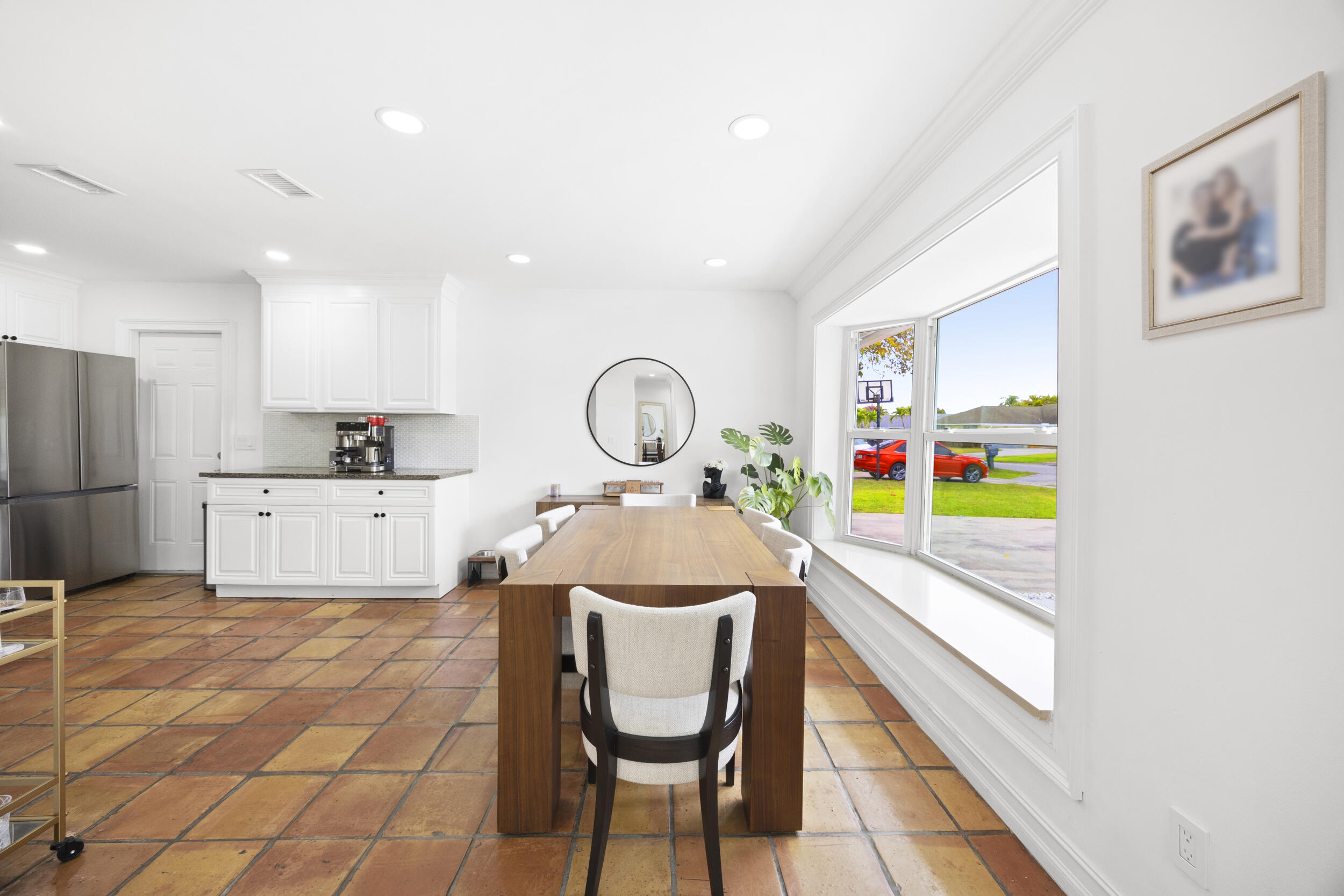11760 Inverness Circle Wellington, FL 33414 - Photo 9 of 33 a living room with furniture and a chandelier