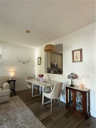 a view of a livingroom with furniture and a couch