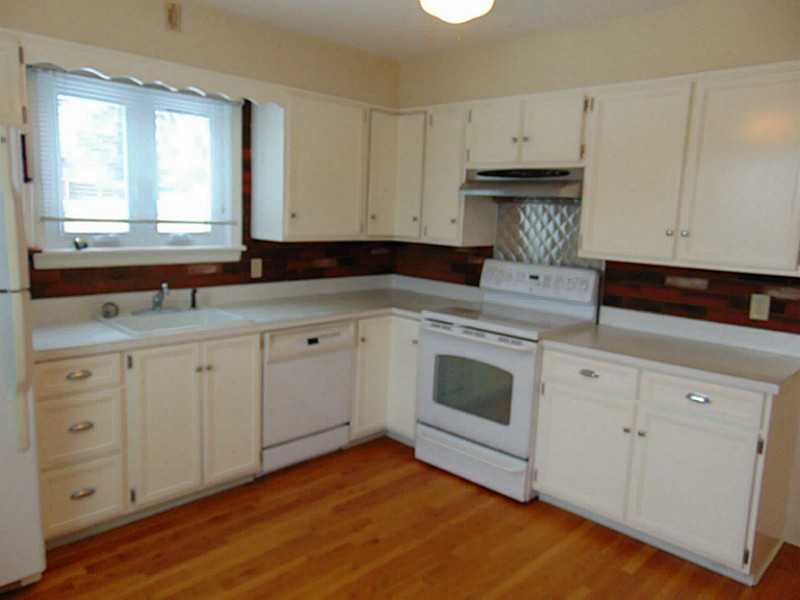 48 Pine Tree Road Portsmouth, RI 02871 - Photo 8 of 25 Kitchen. Bright kitchen, with hard wood floors, appliances stay..