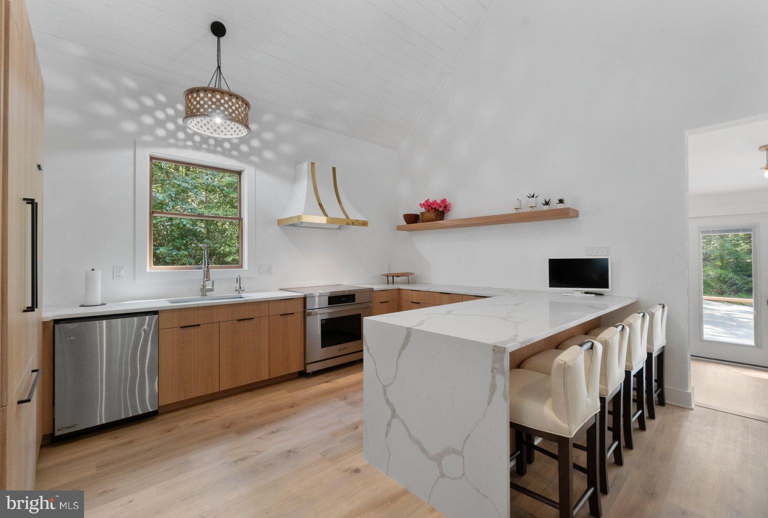 851 Bacon Hall Road Sparks, MD 21152 - Photo 19 of 50 Modern kitchen with sleek design elements.