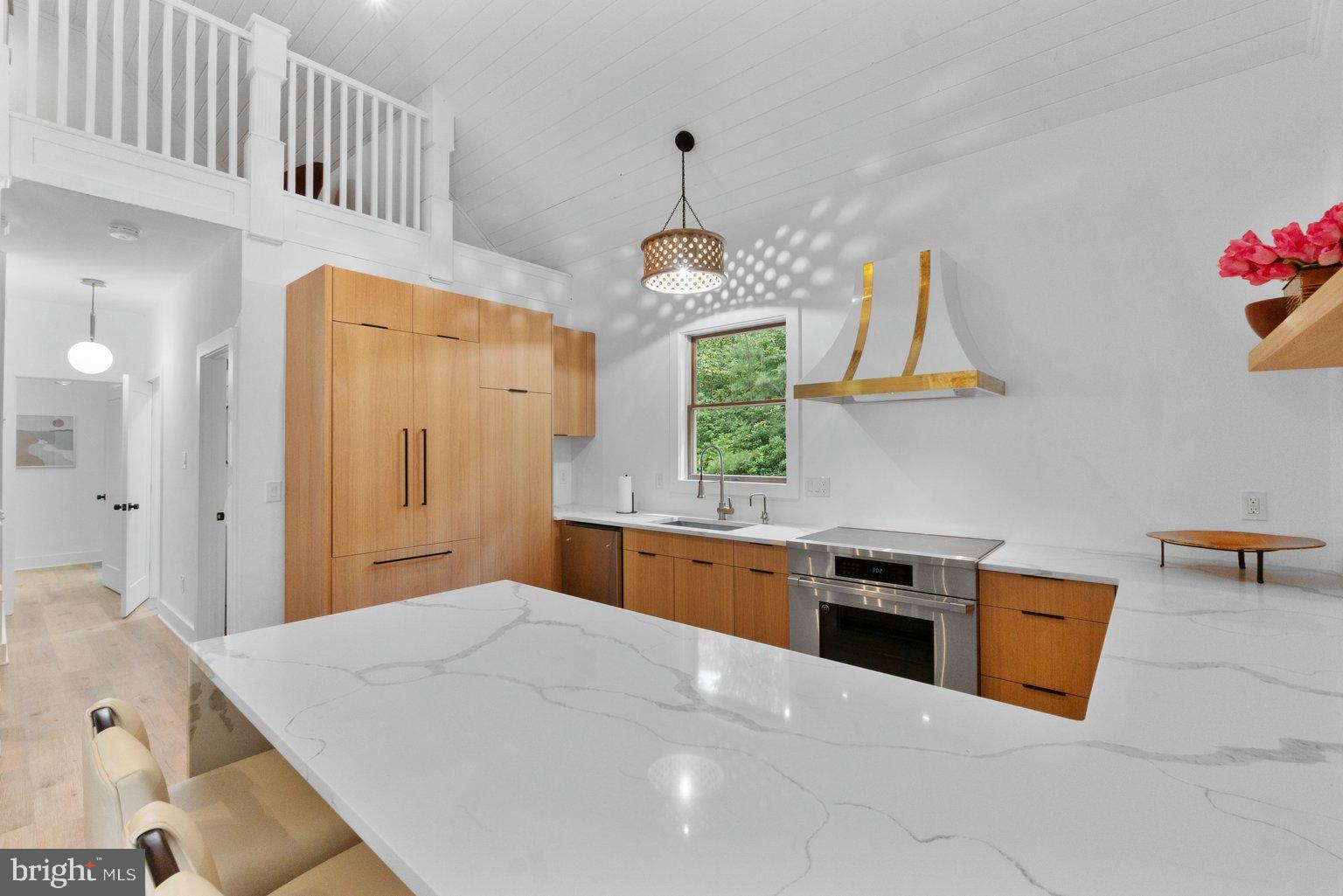 851 Bacon Hall Road Sparks, MD 21152 - Photo 20 of 50 Modern kitchen with sleek design elements.