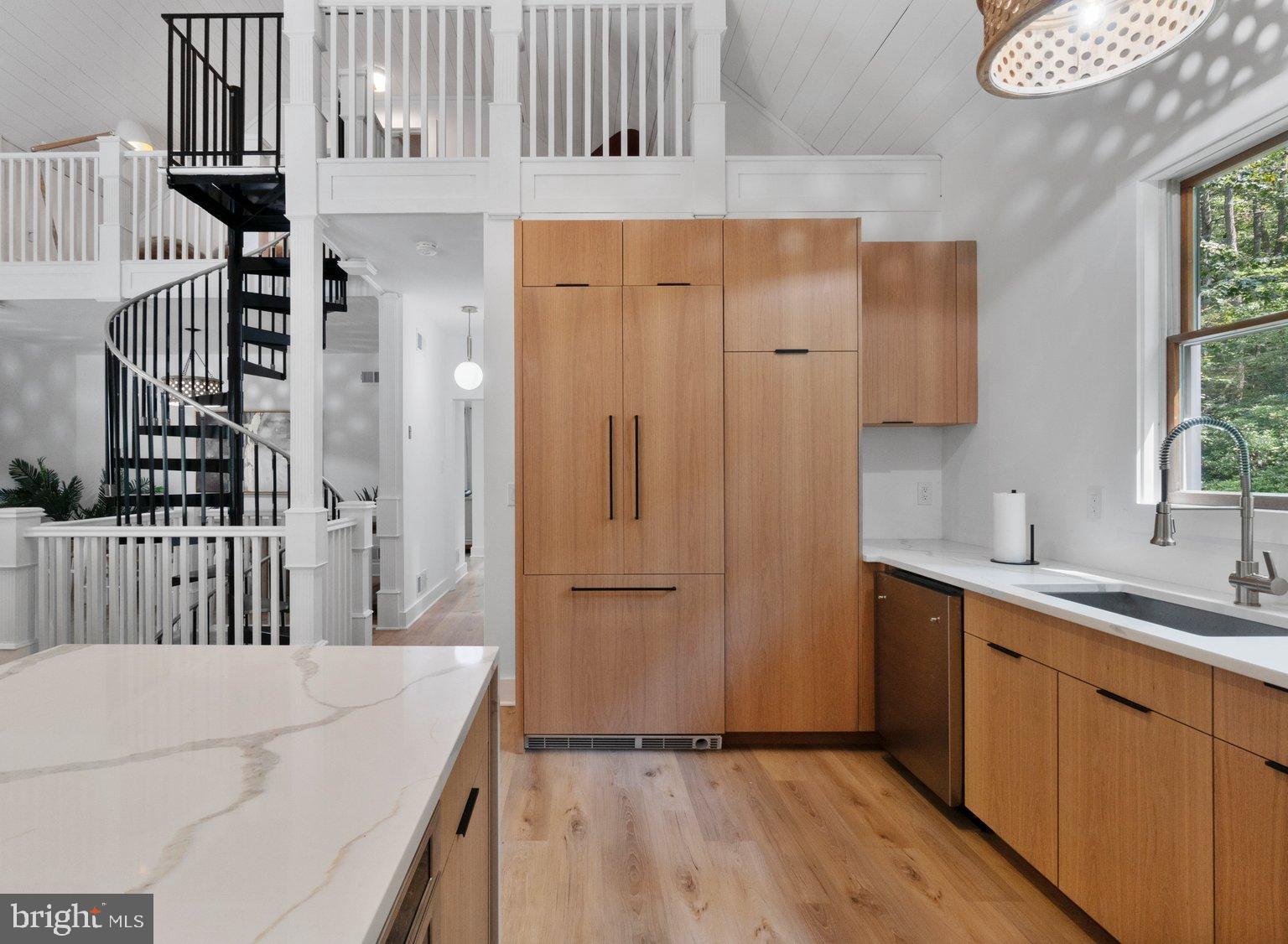 851 Bacon Hall Road Sparks, MD 21152 - Photo 23 of 50 Modern kitchen with sleek wood finishes.