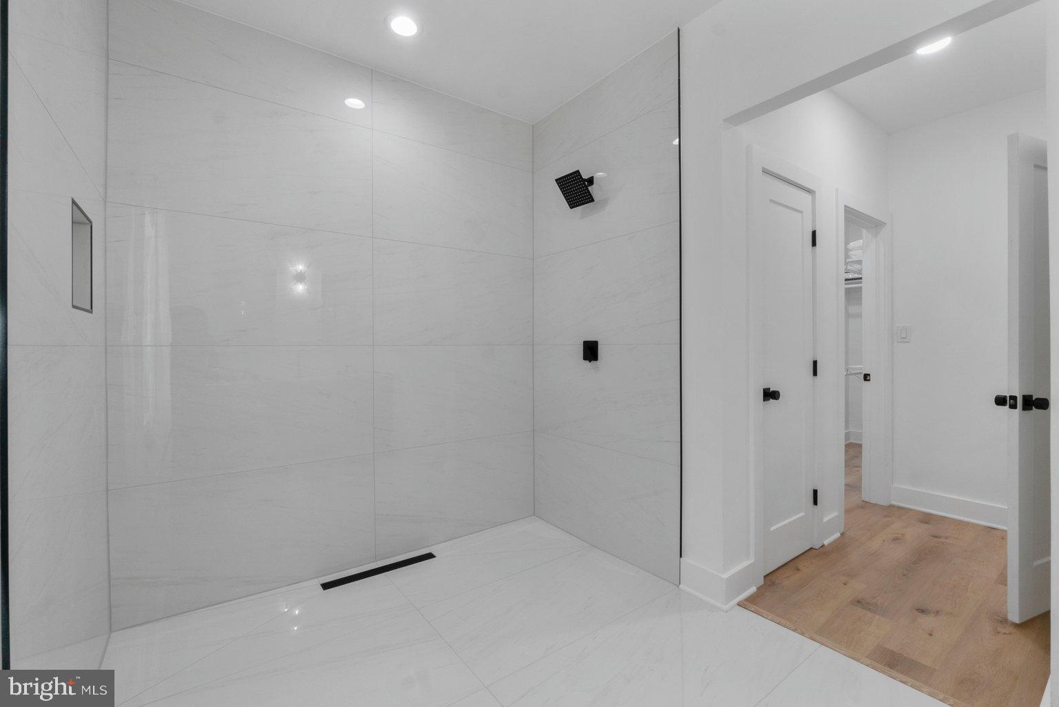 851 Bacon Hall Road Sparks, MD 21152 - Photo 32 of 50 Sleek, modern shower space with elegant tiles.