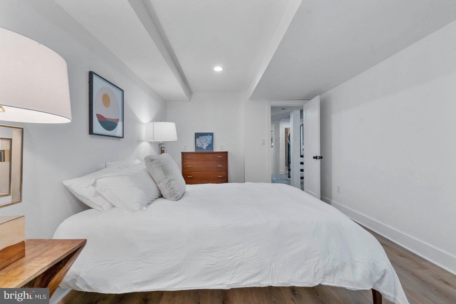 851 Bacon Hall Road Sparks, MD 21152 - Photo 37 of 50 Serene bedroom with modern minimalist design.